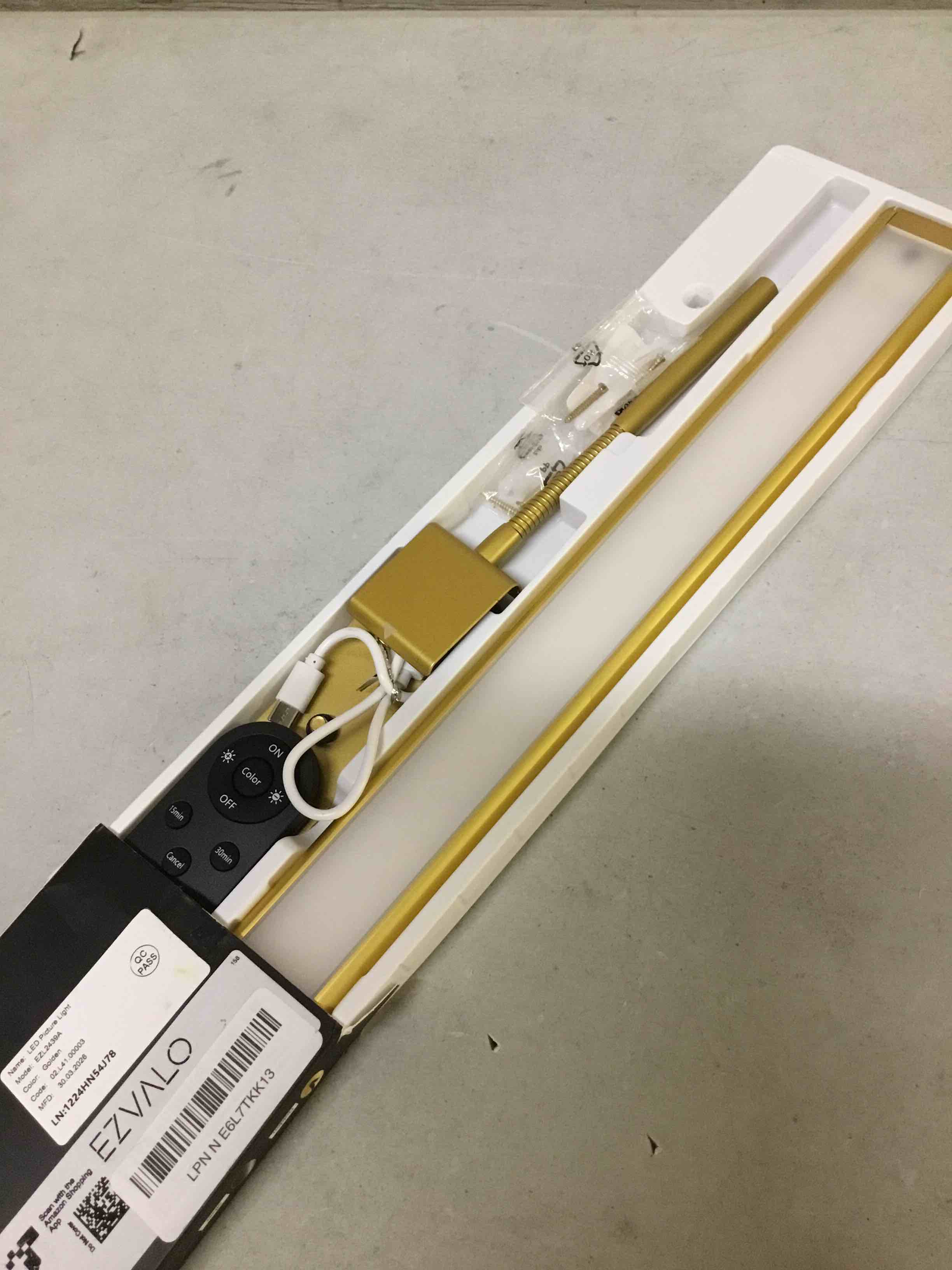 Condition photo showing As Is for ezvalo picture light for wall, 4800mah rechargeable wireless remote, 16in dimmable magnetic led art display light with 3 color temperatures, for gallery, living room, bedroom, hallway (gold) gold 16inch 1