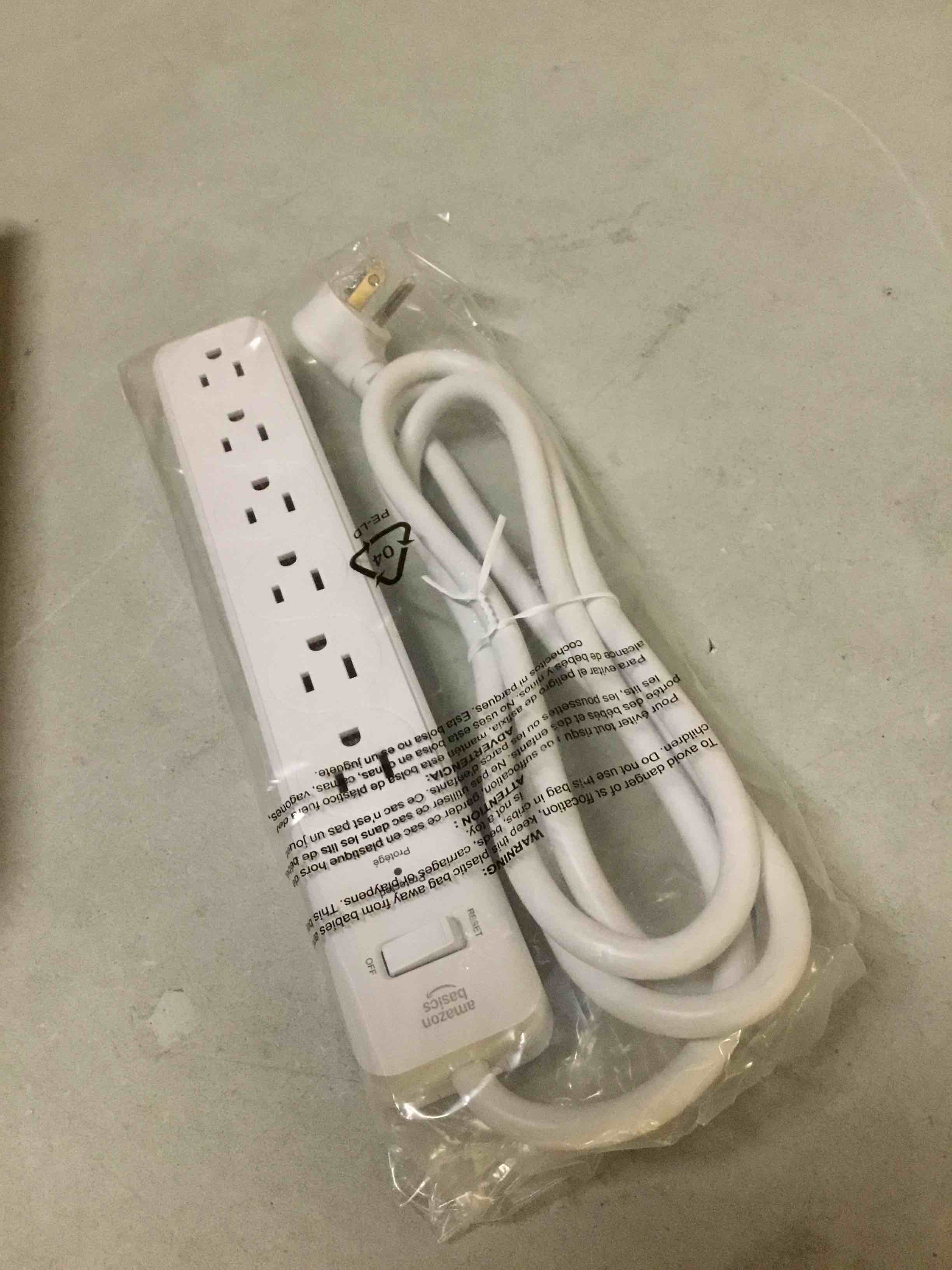 Condition photo showing New/Like New for amazon basics surge protector power strip, 6-outlet, 790 joules, 6ft extension cord, safety shutters, white