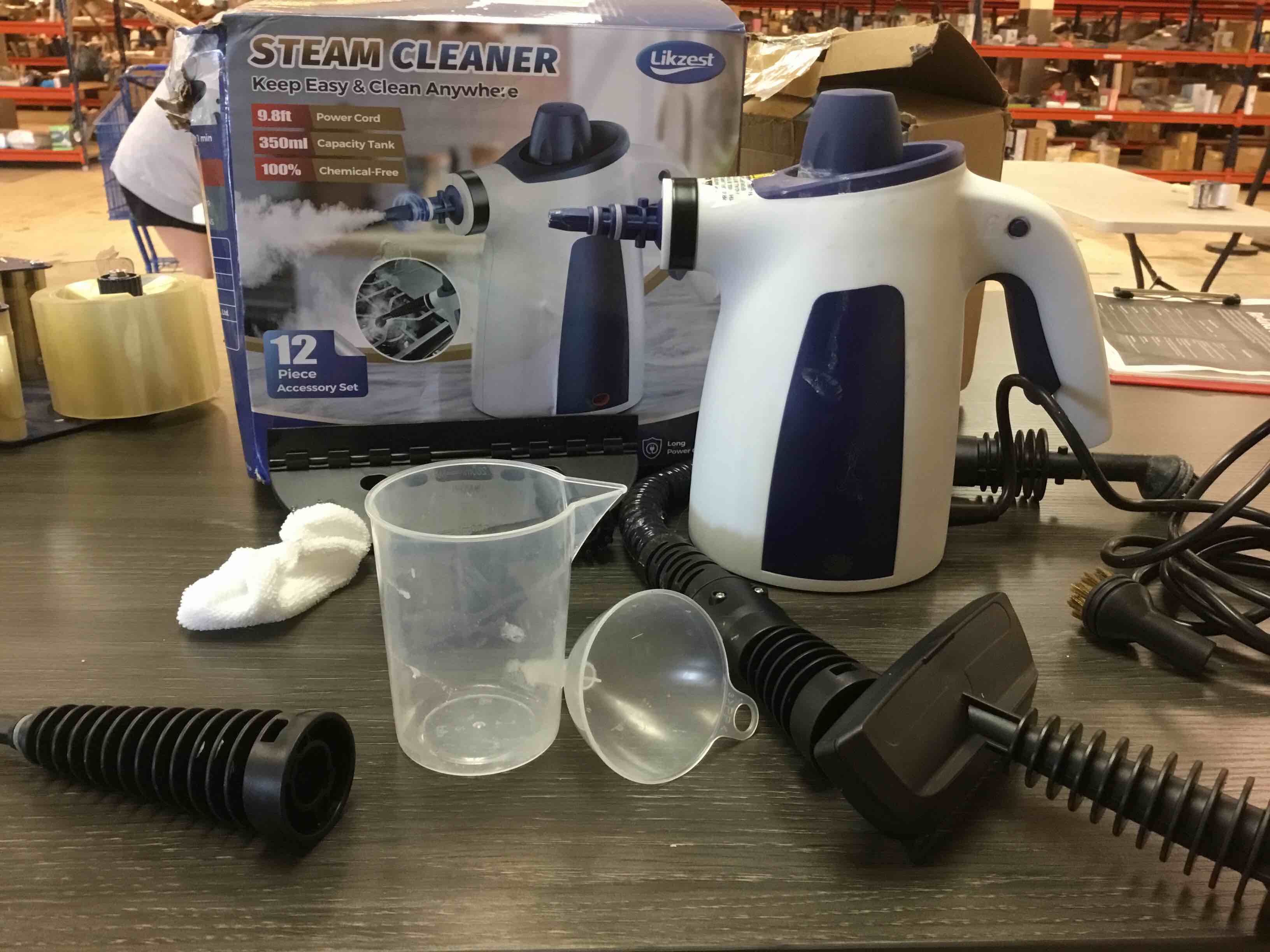 Condition photo showing As Is for handheld steam cleaner, 230°f pressurized steamer with no water spitting & continuous steam, 350ml chemical-free deep cleaning for grease & grime, 12 accessories for grout, bathroom, kitchen & car ice white & sky blue