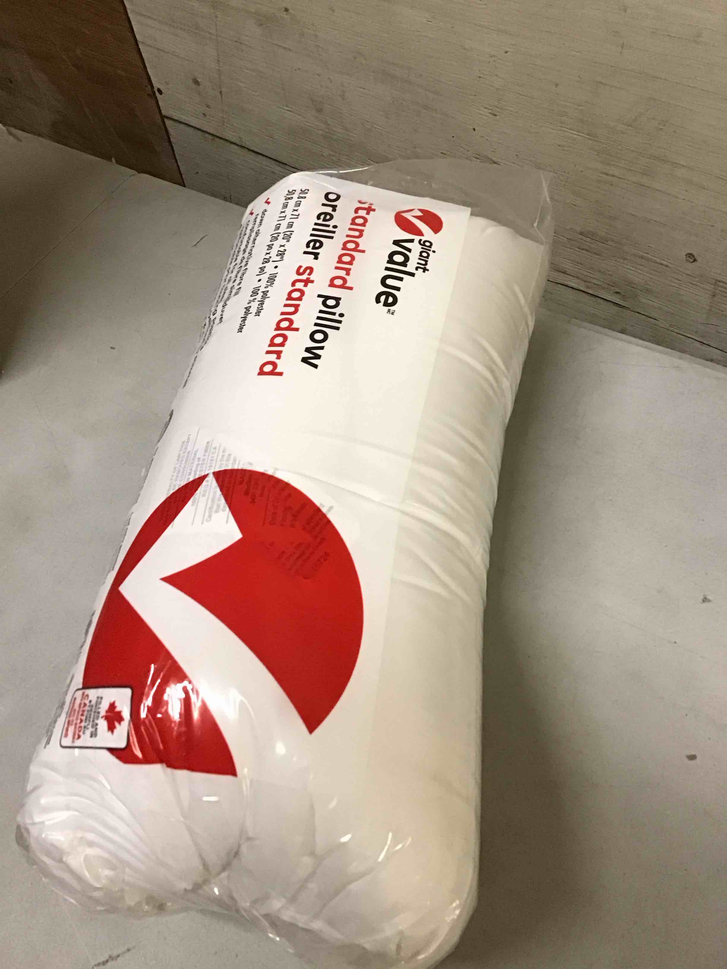 Condition photo showing New/Like New for giant value standard pillow size 20x28