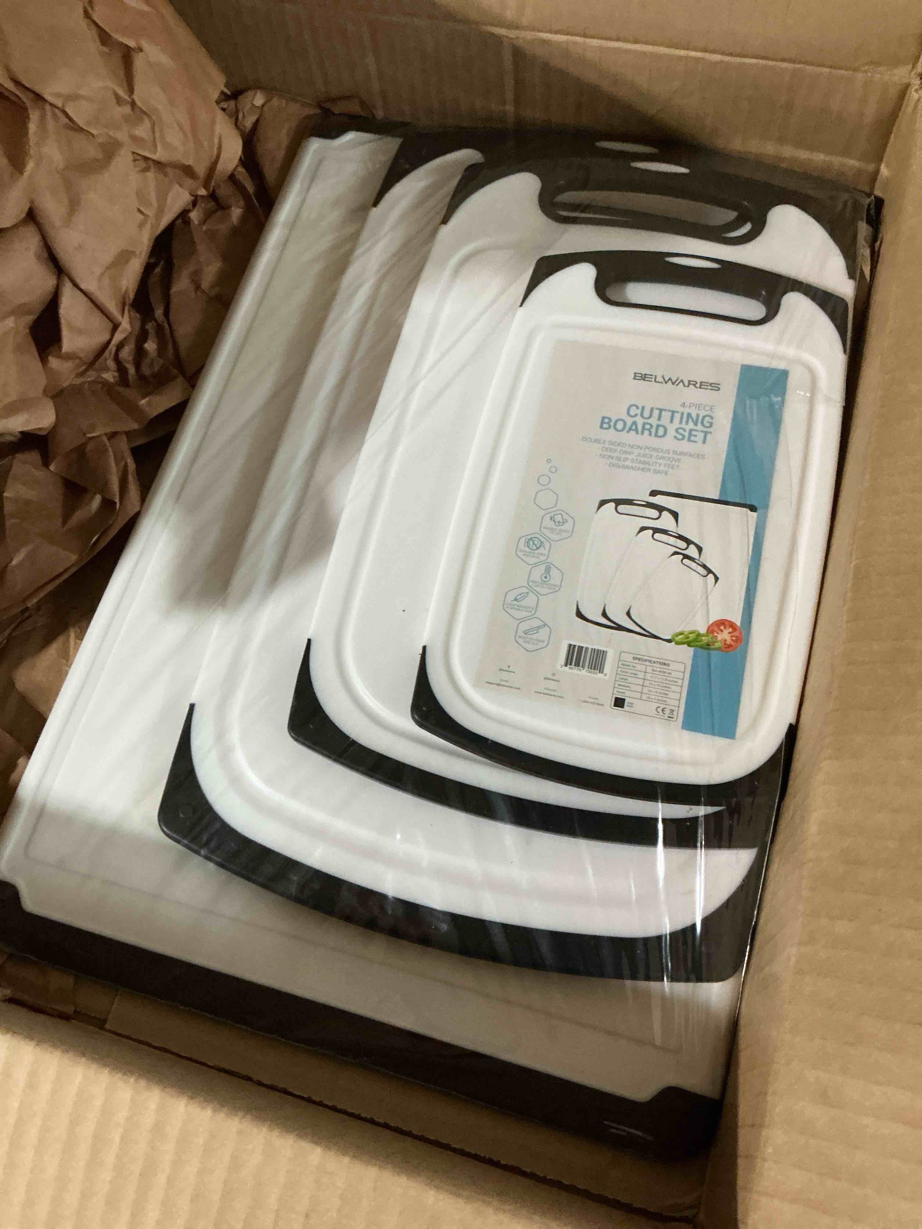 Condition photo showing New/Like New for belwares plastic cutting board set of 4  with non-slip feet & deep drip juice groove