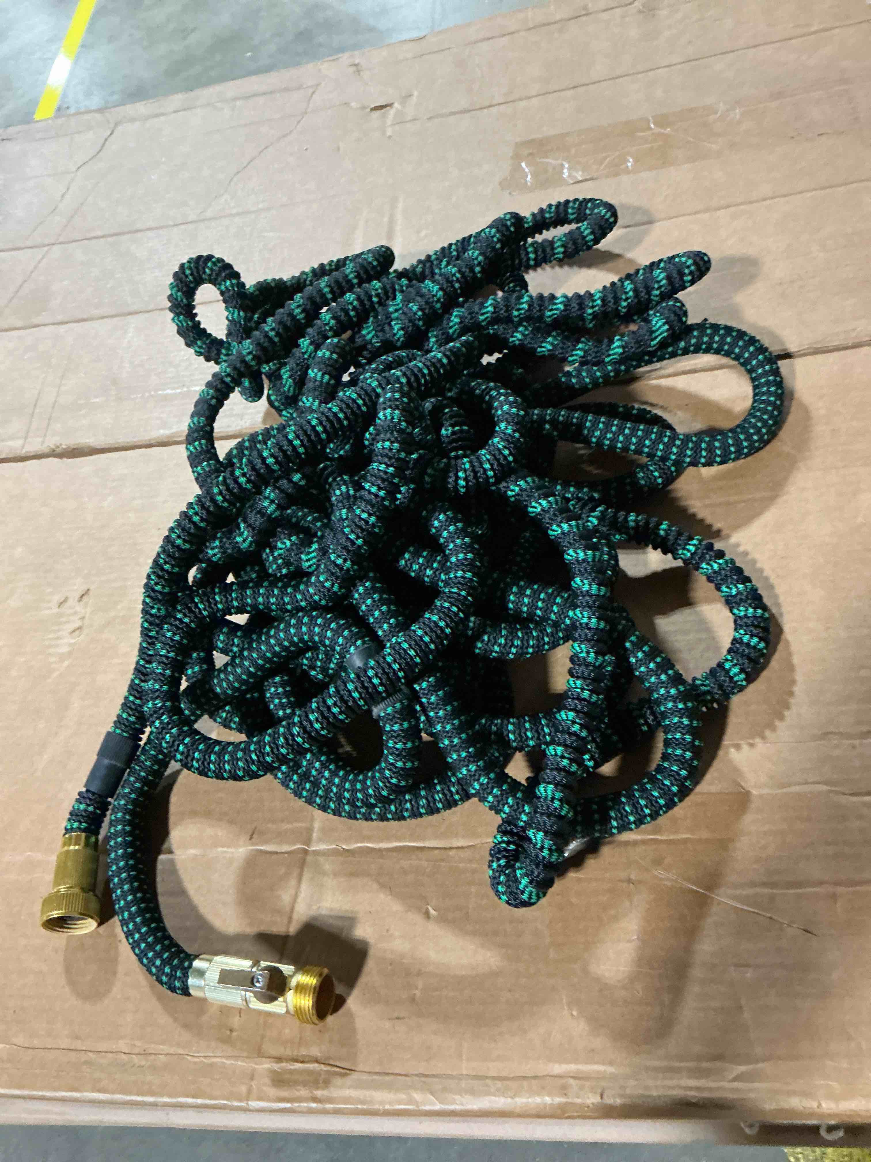 Condition photo showing As Is for 100 ft garden hose,2026 new improved lightweight all-weather water hoses, ultra durable and flexible garden hose with 10-function spray nozzle, leak-free connections garden hose for yard, lawn,outdoor blackgreen 100ft