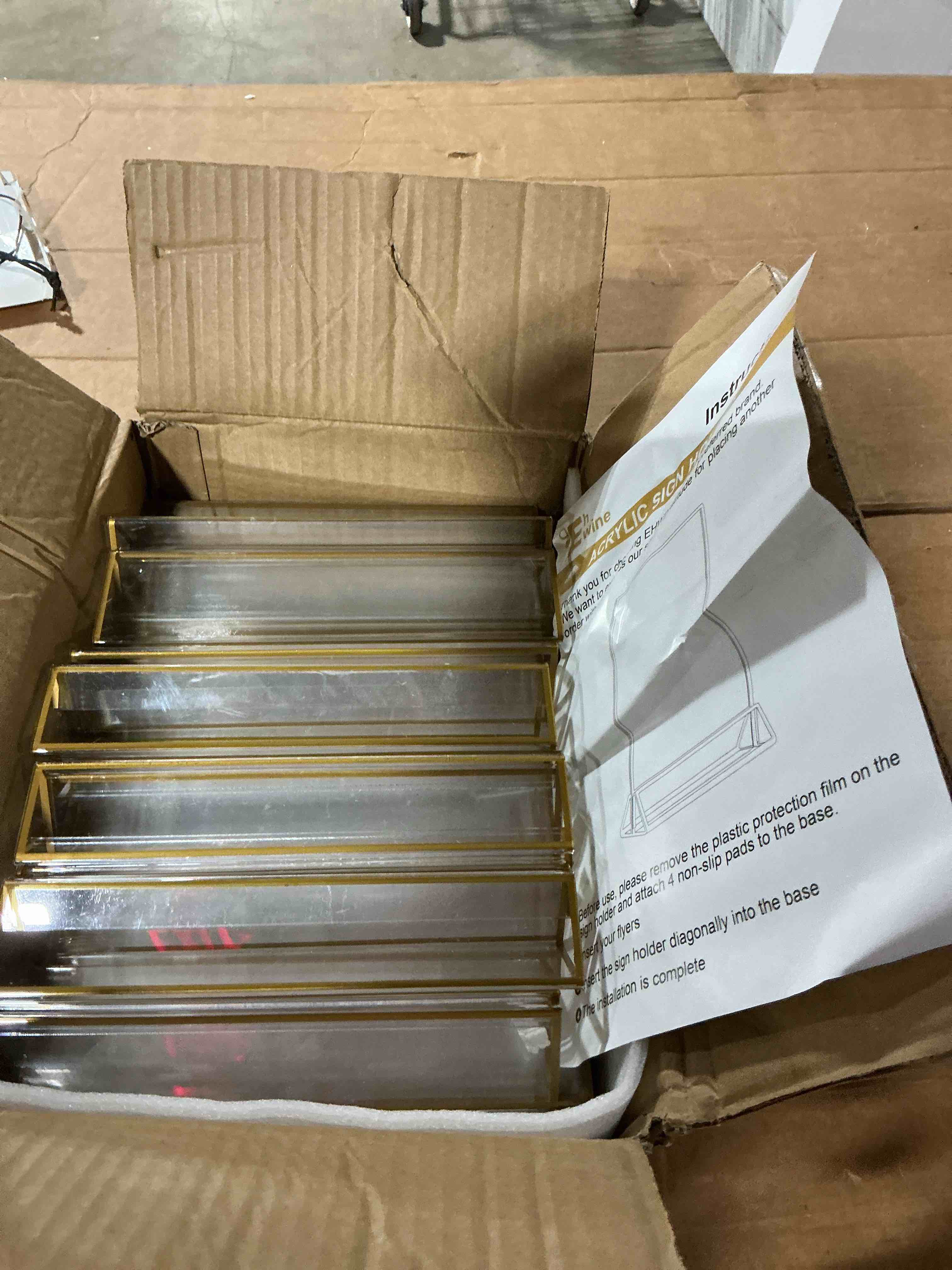 Condition photo showing As Is for ehwine 8 pack acrylic sign holder 8.5 x 11, double sided gold picture frame stand up table top sign holders, clear display stand menu flyer holder for wedding party (provide non-slip mats) gold 8 pack 8.5x11 inch