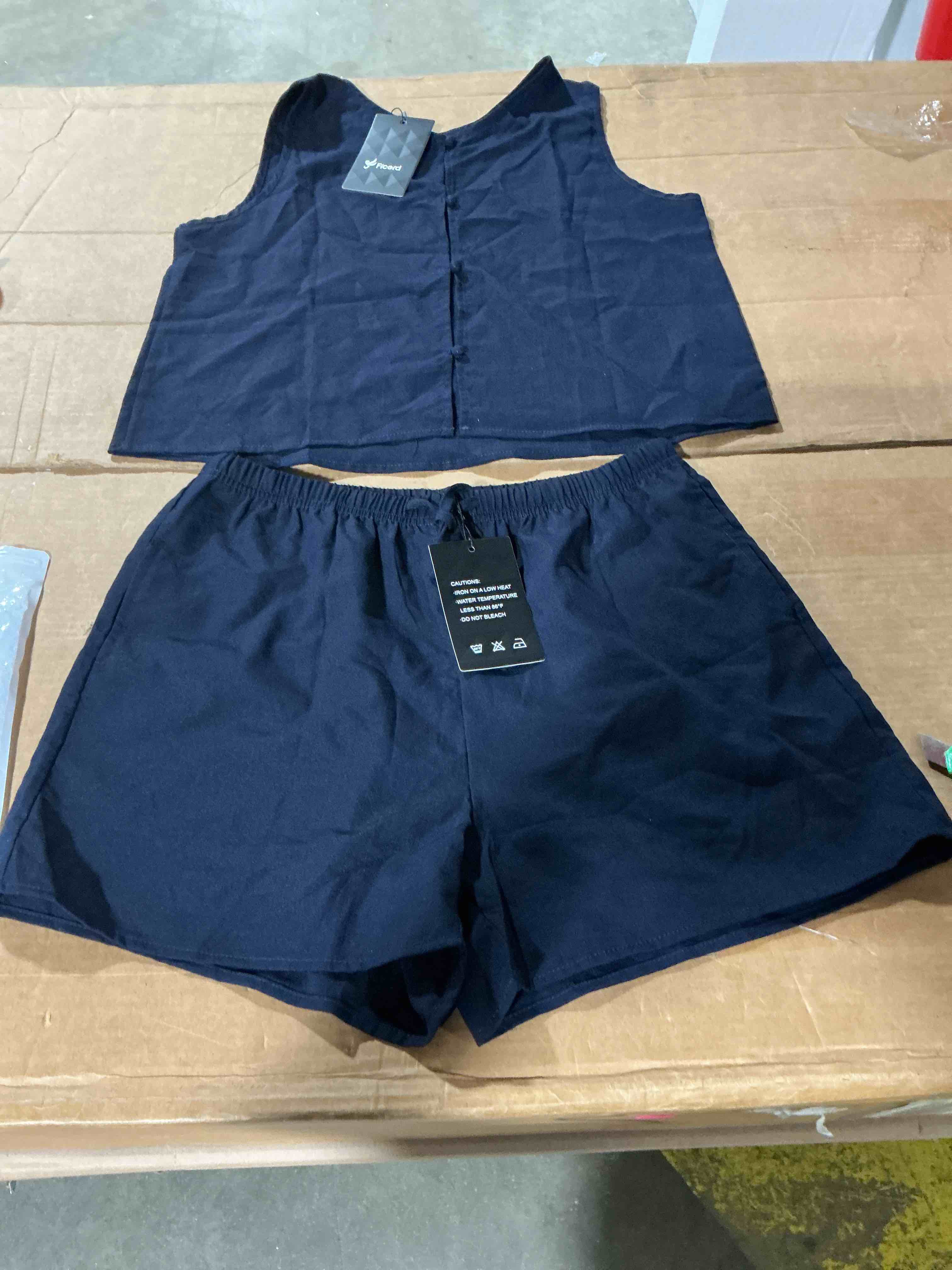 Condition photo showing Good Condition for ficerd two piece short sets for women lounge pj set casual outfits | 2026 summer sleeveless side slit knit 2 piece lounge set with pockets beach vacation airport travel. blue navy, size medium (different stock model) see additional photo