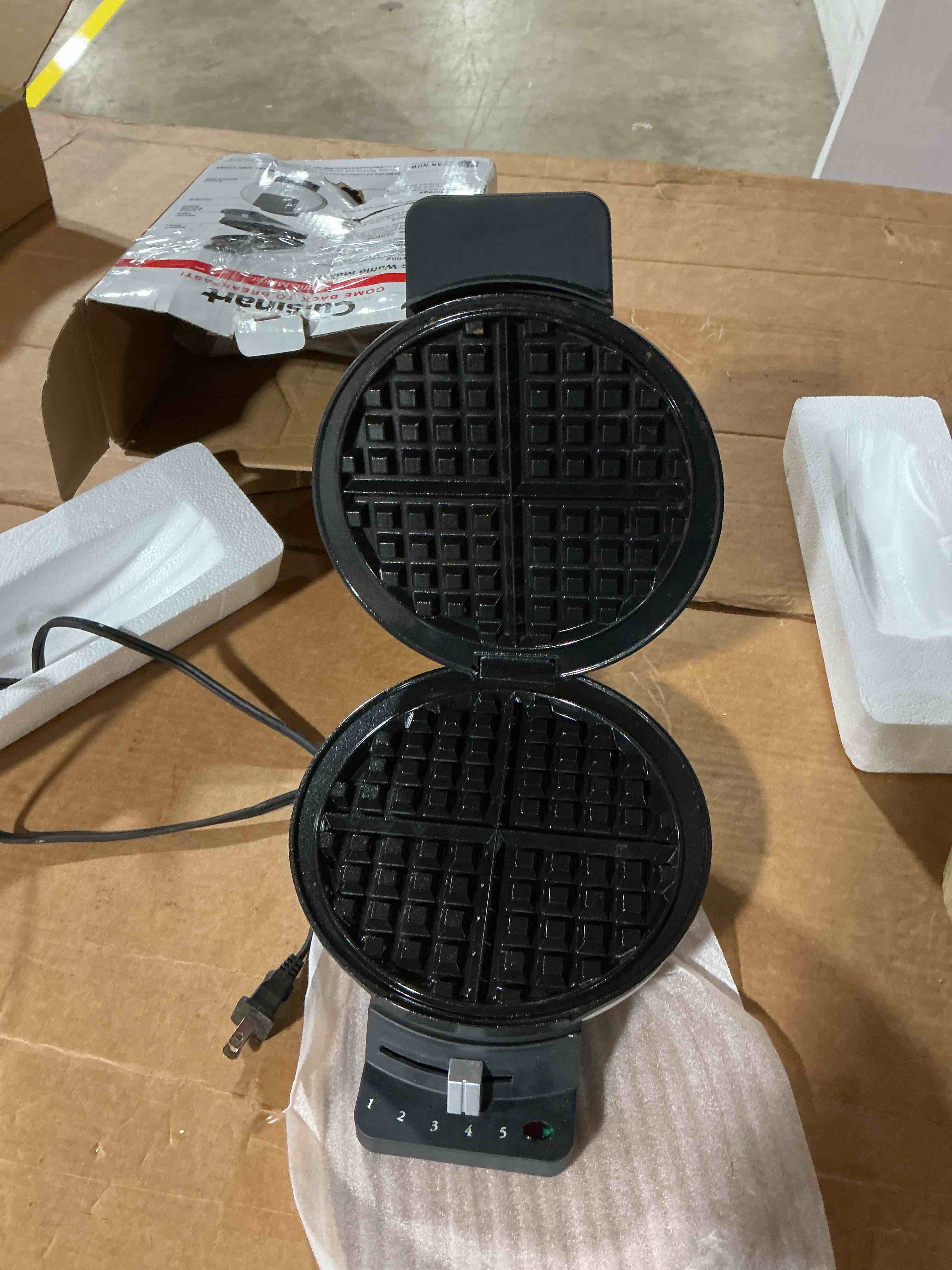 Condition photo showing As Is for cuisinart waffle maker, 1250w round classic waffle iron, 5-setting adjustable browning control, wmr-canas, brushed stainless new round classic round