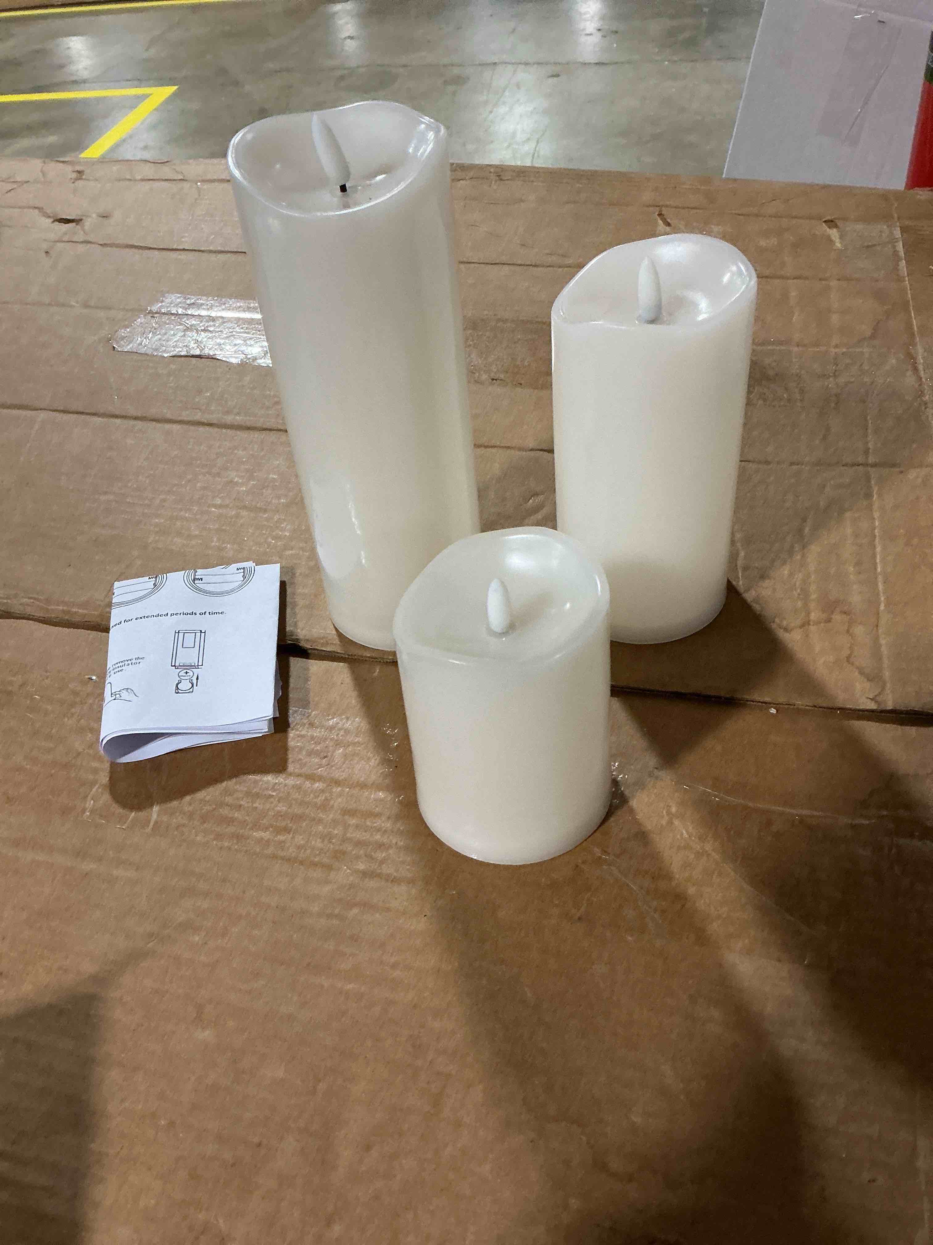 Condition photo showing As Is for outdoor flameless candles with remote timer - waterproof realistic flickering led pillar electric battery operated fake candle for holiday home wedding fireplace decor - ivory white 3 pack (4”6”8”) ivory white d3"h 4"6"8"