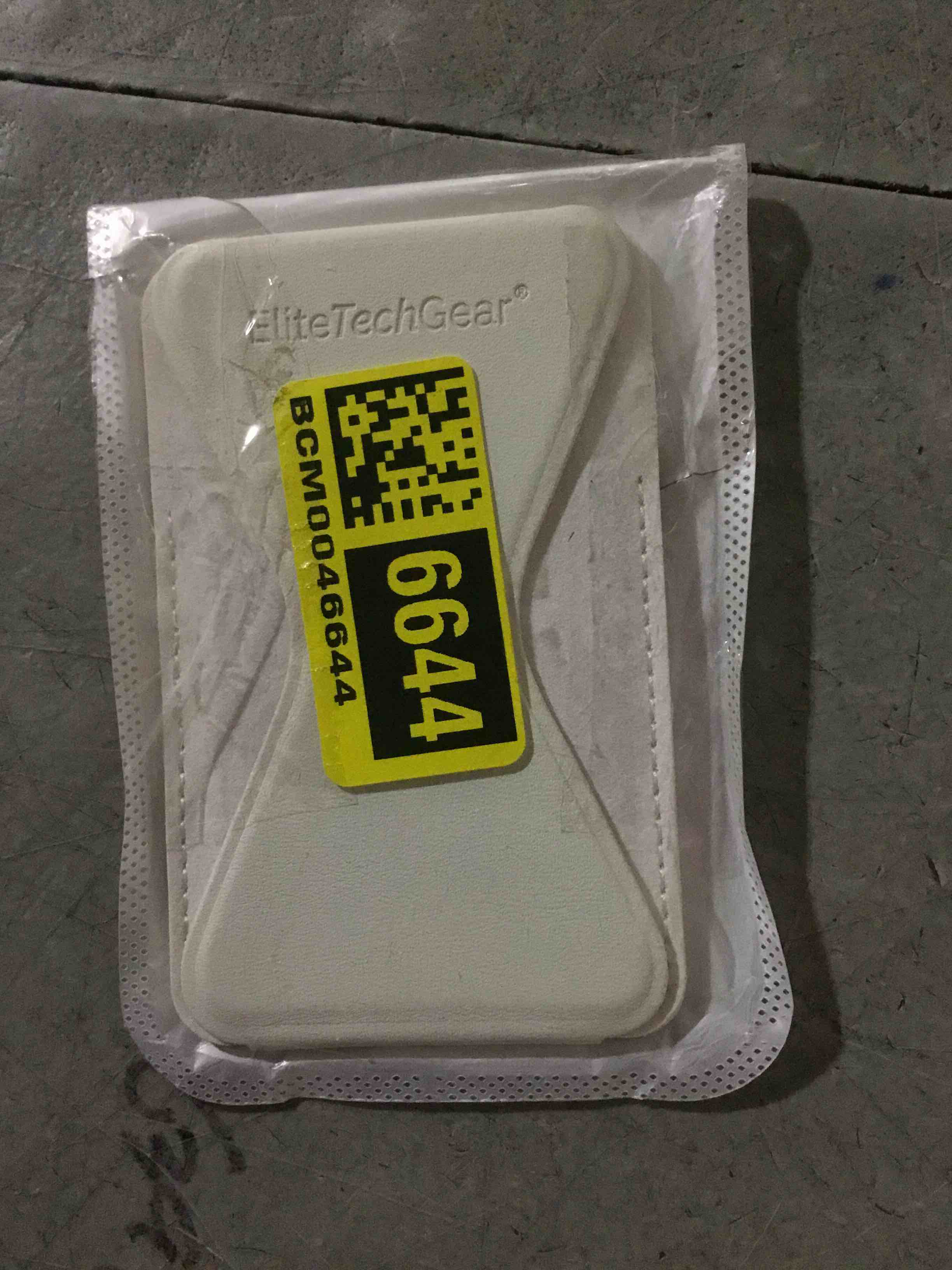 Condition photo showing New/Like New for Elite Tech Gear Secure Phone Card Holder with Adjustable Stand Beige