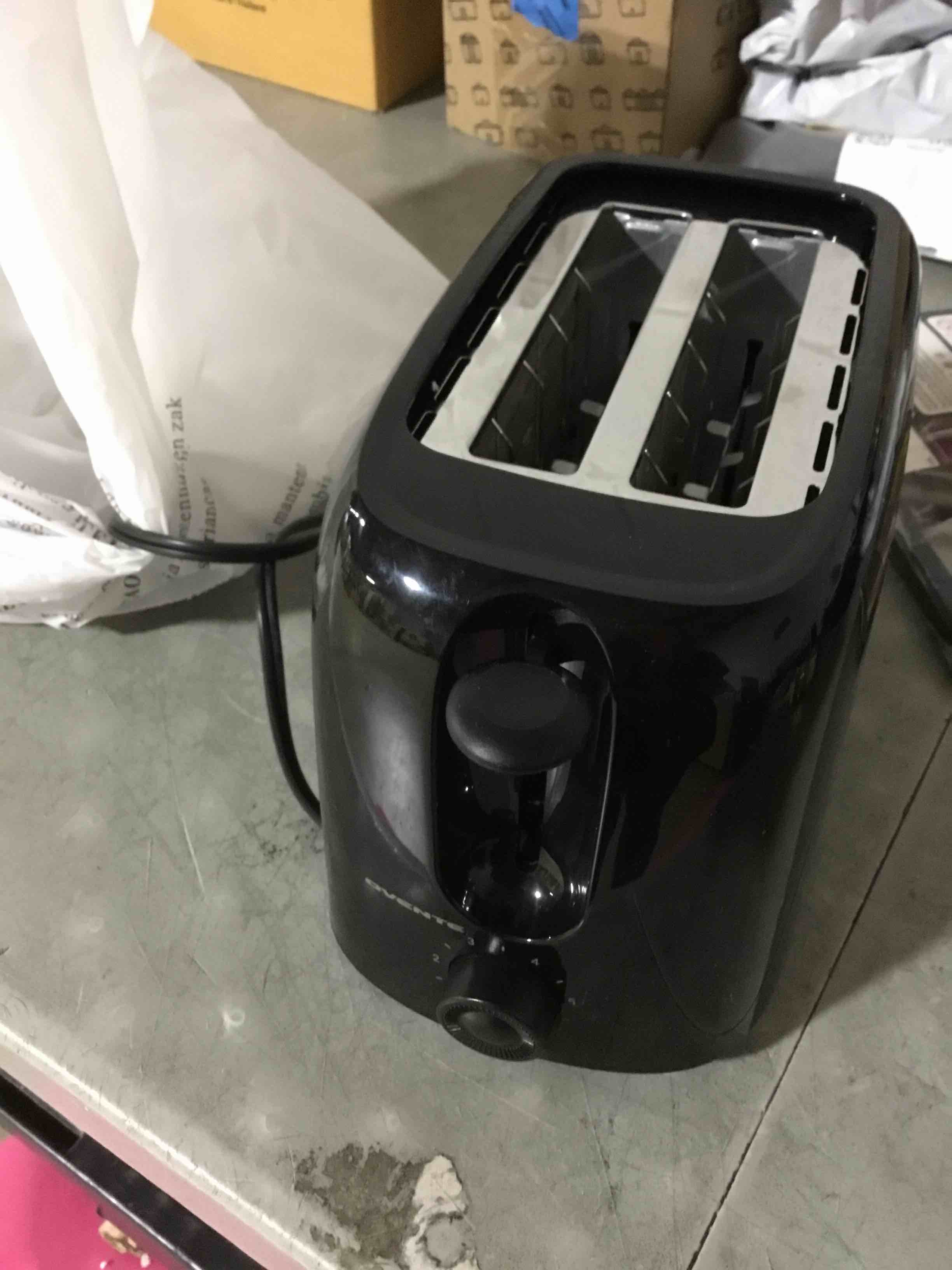 Condition photo showing As Is for OVENTE Electric Toasters TP2210B