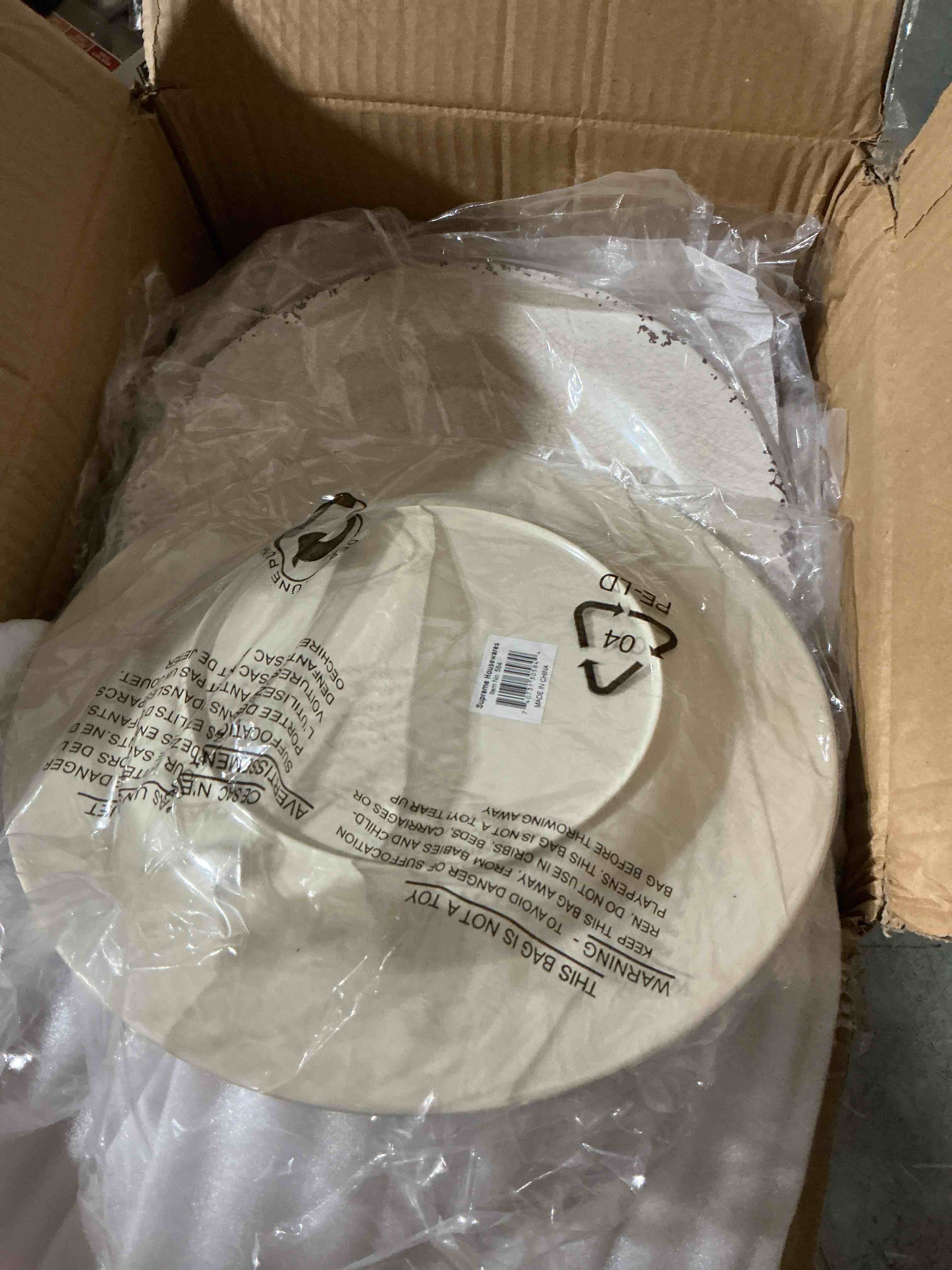 Condition photo showing New/Like New for 6-piece crackle 11" melamine plate set, cream
