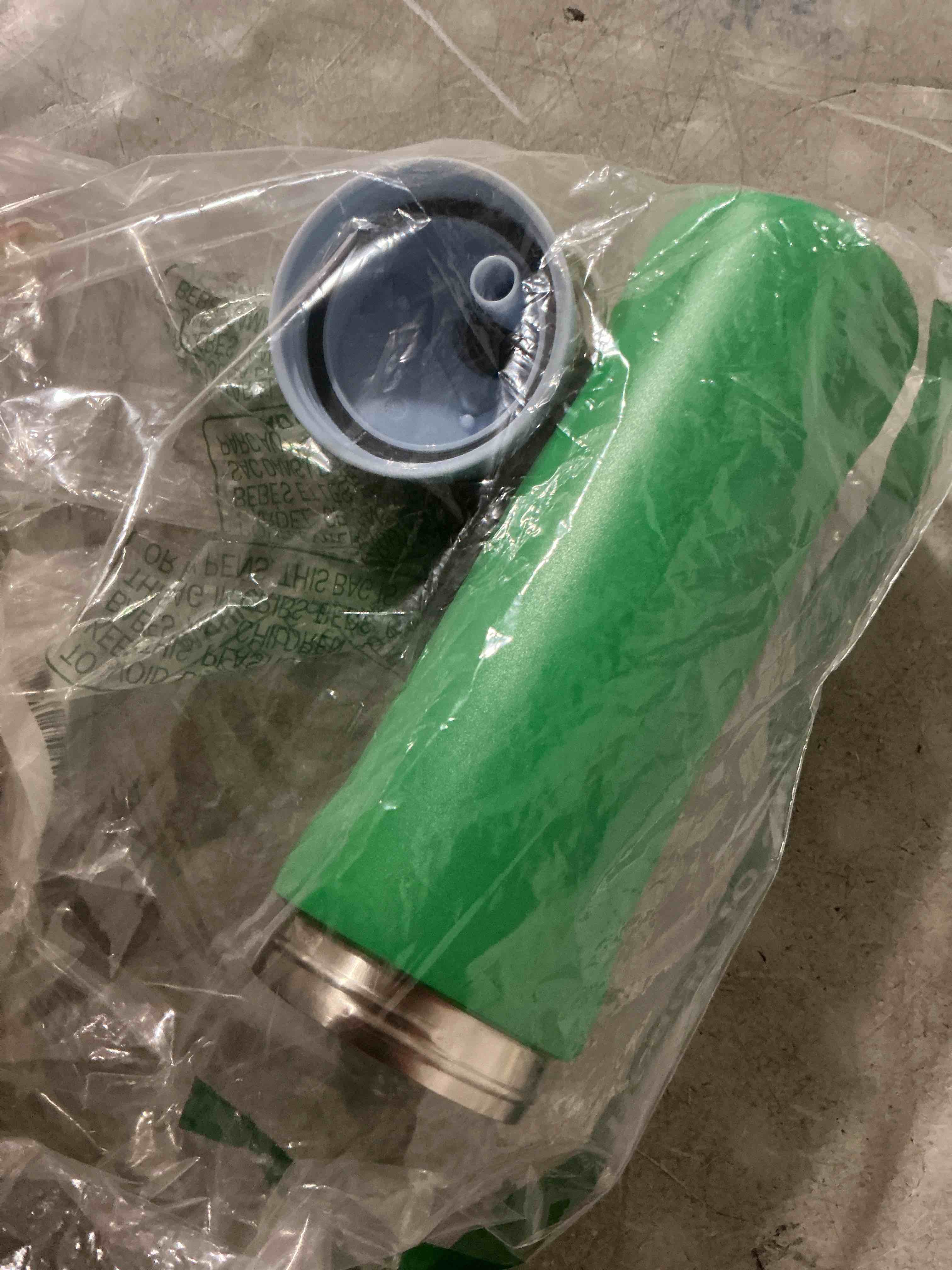 Condition photo showing As Is for (used) owala freesip insulated stainless steel water bottle with straw, bpa-free sports water bottle, great for travel, 24 oz, putting green putting green 24 ounces