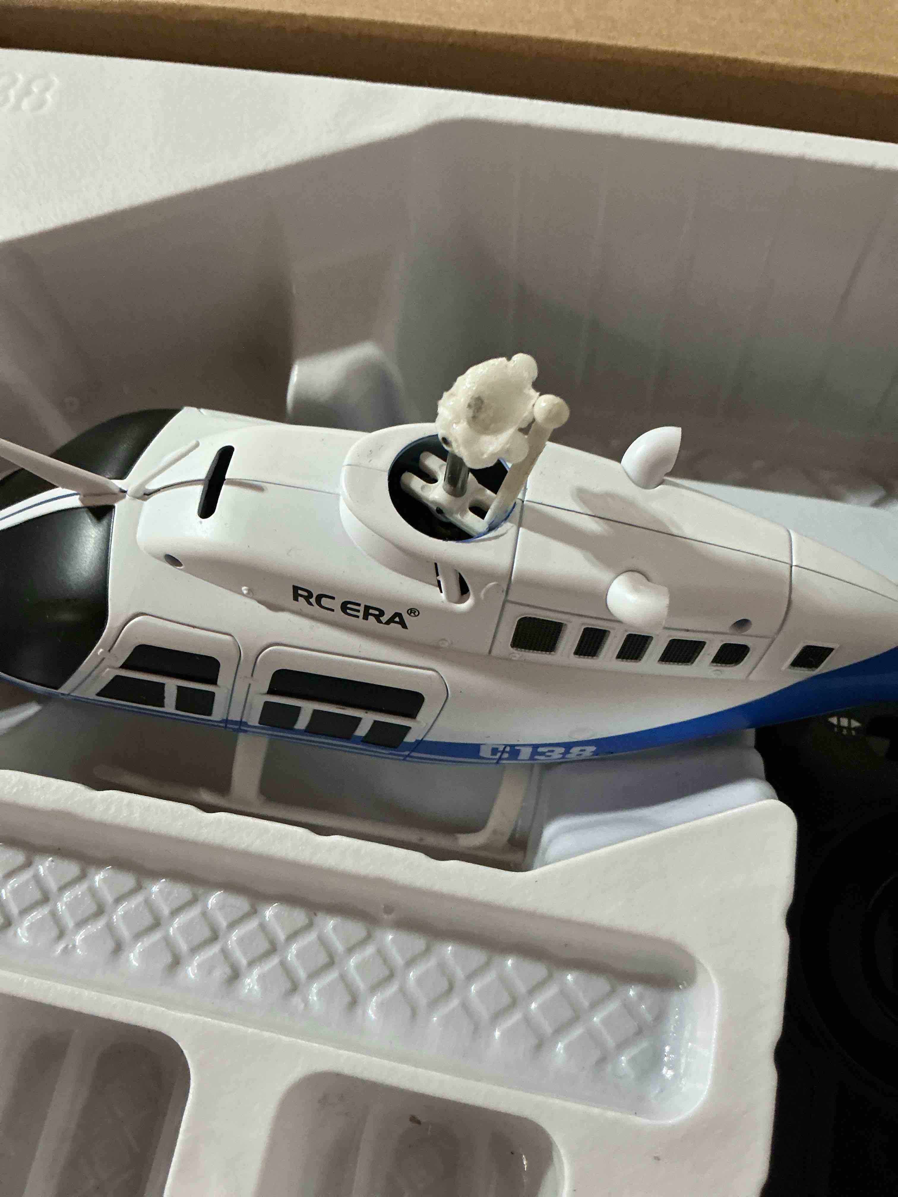 Condition photo showing As Is for flycolor c138 rc helicopter 2.4g 6ch 6-axis gyro altitude hold 1/33 remote control plane ready to fly rtf(blue-white) helicopter-blue