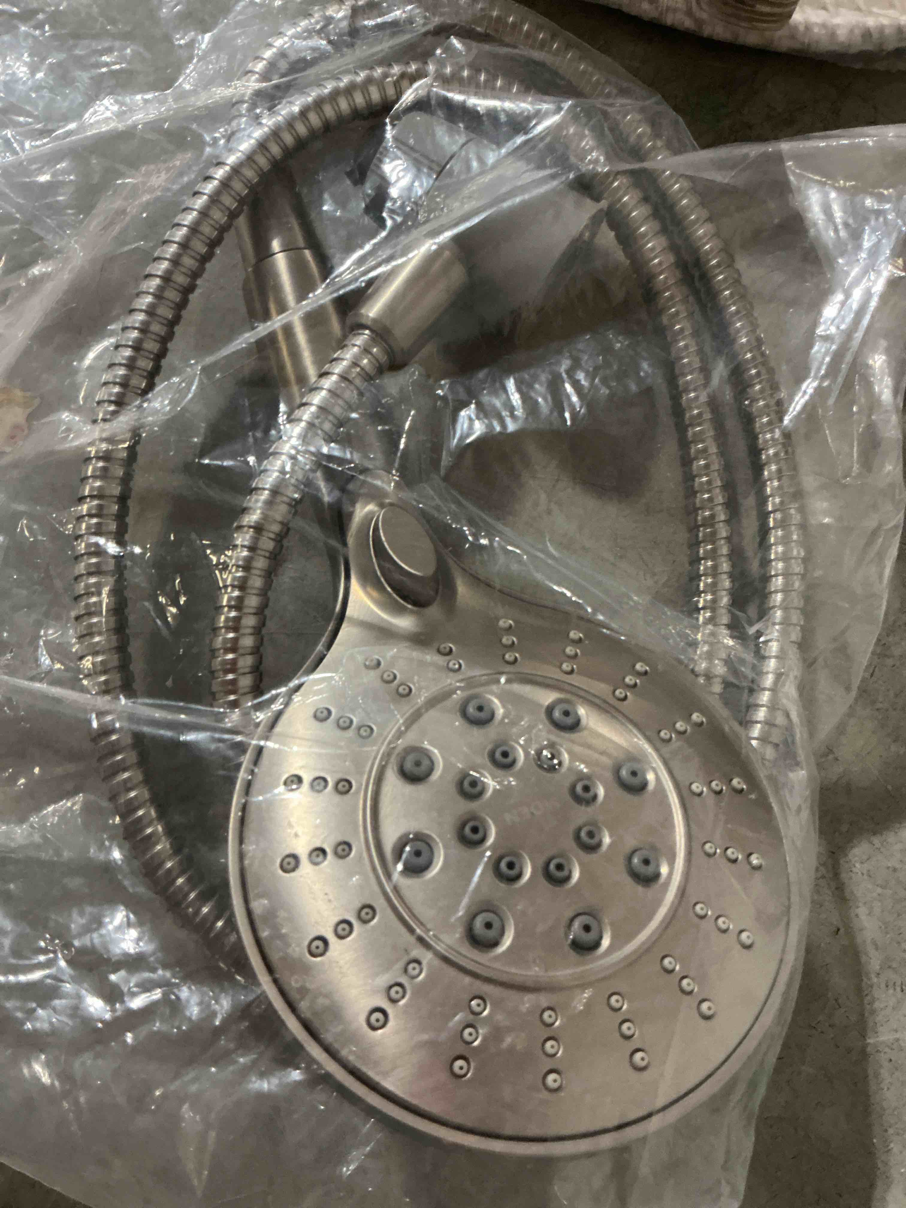 Condition photo showing As Is for moen engage spot resist brushed nickel six-function 5.5-inch removable handheld showerhead with magnetic docking system, 26112srn spot resist brushed nickel 5.5-inch