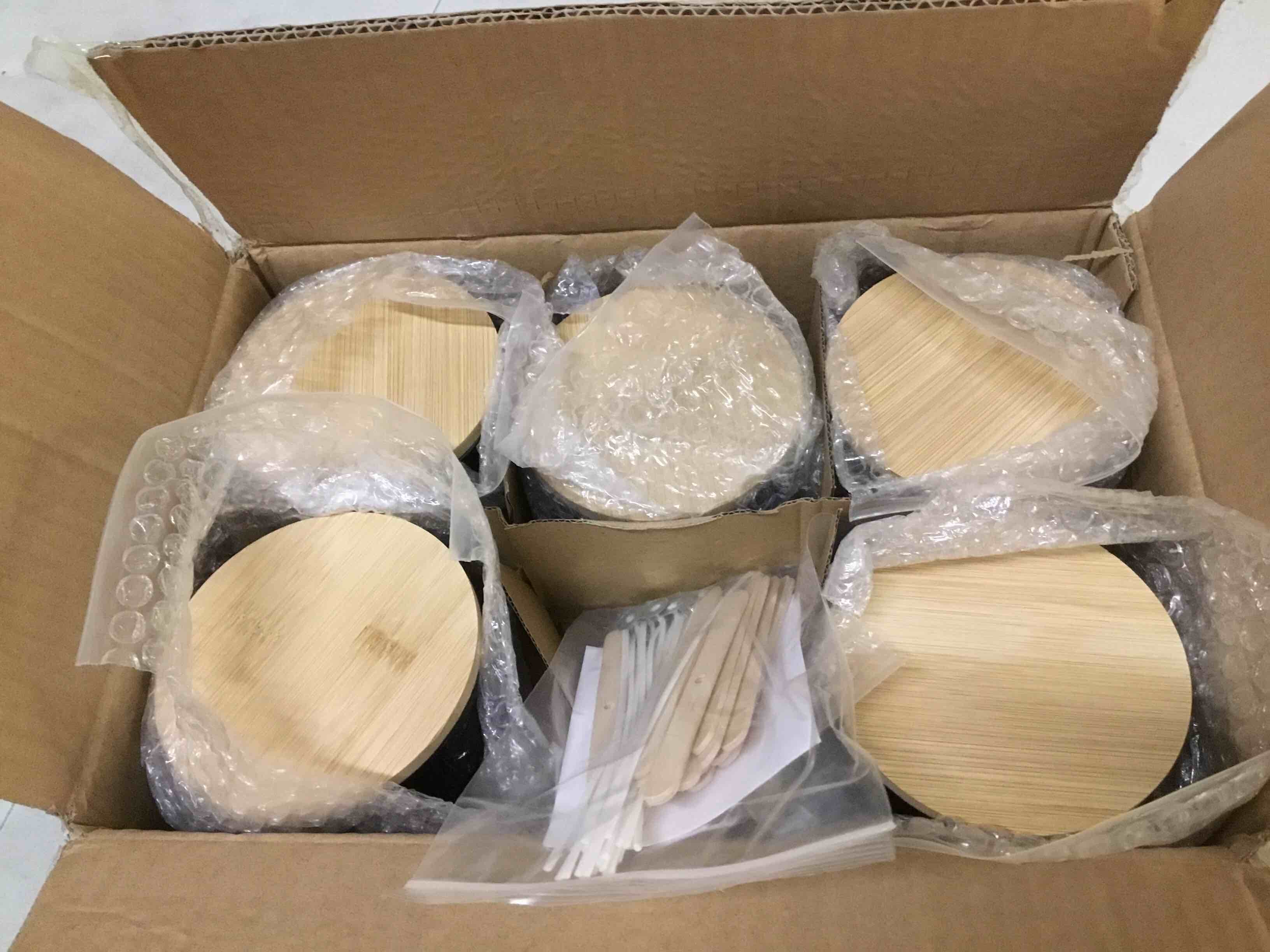 Condition photo showing As Is for connoo 6-pack 16 oz black candle jars - 3-wick empty glass wide mouth candle jars come with bamboo lids, sticky warning labels, and a candle wick kit for candle making - dishwasher safe black-bamboo lids-6pcs 16oz