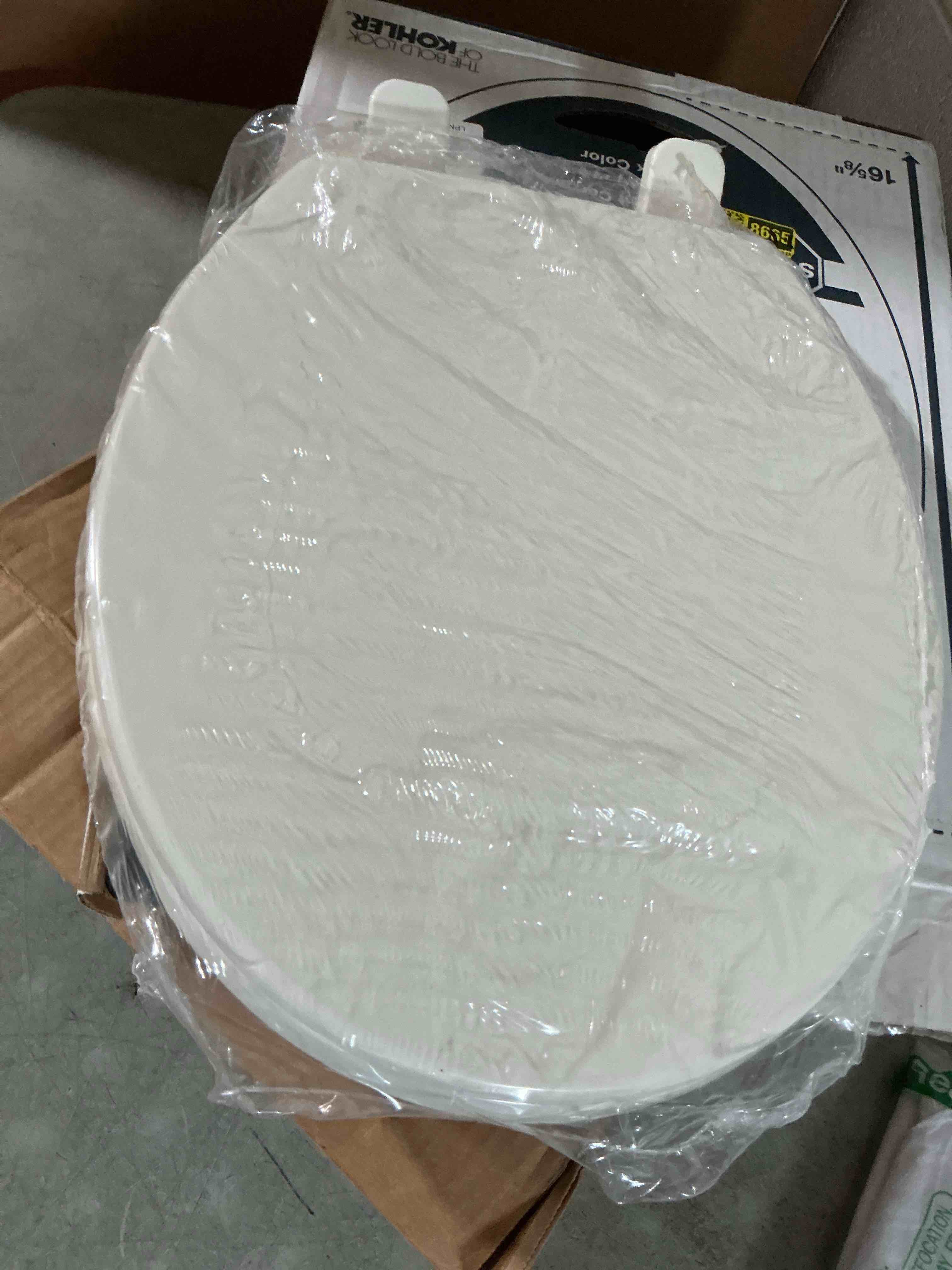 Condition photo showing As Is for kohler 4639-rl-0 cachet readylatch round toilet seat soft close, white white round ready latch