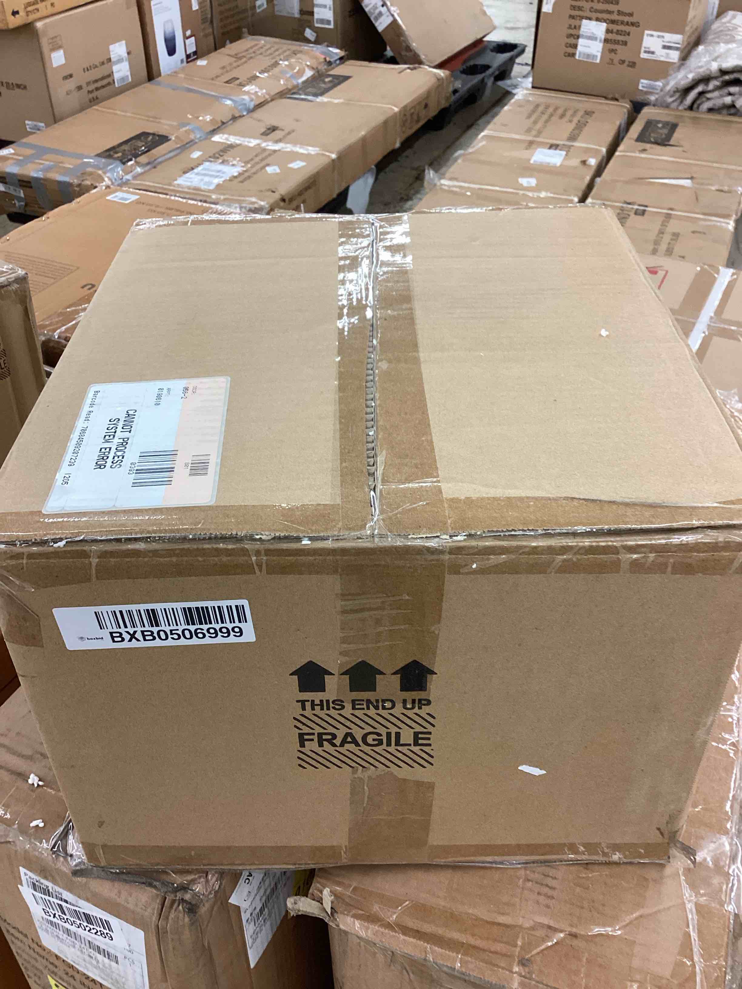 https://s3.amazonaws.com/lotting-images-prod/BoxBids/BXB0506999_1780322051386.jpeg