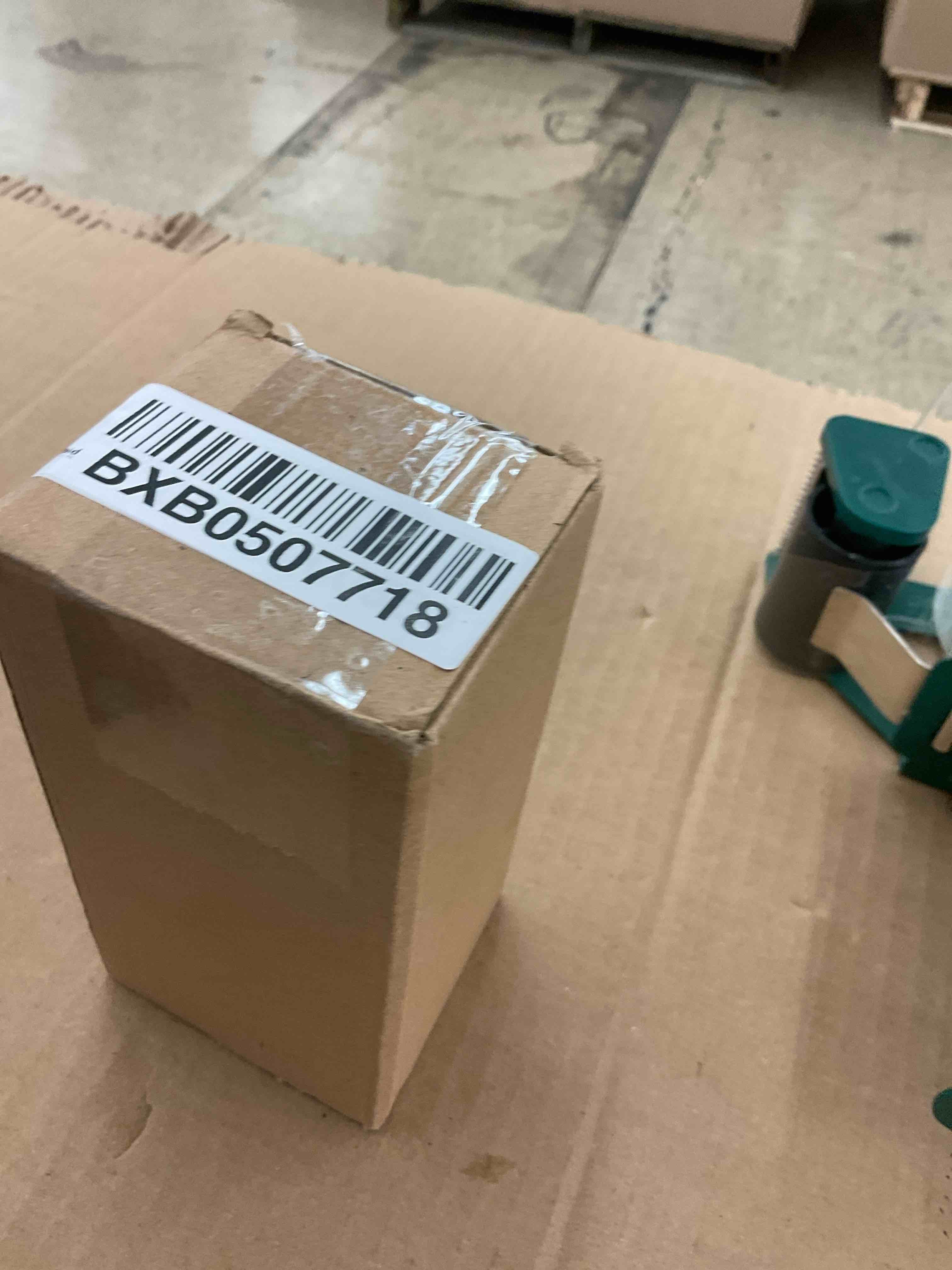 https://s3.amazonaws.com/lotting-images-prod/BoxBids/BXB0507718_1779809653035.jpeg