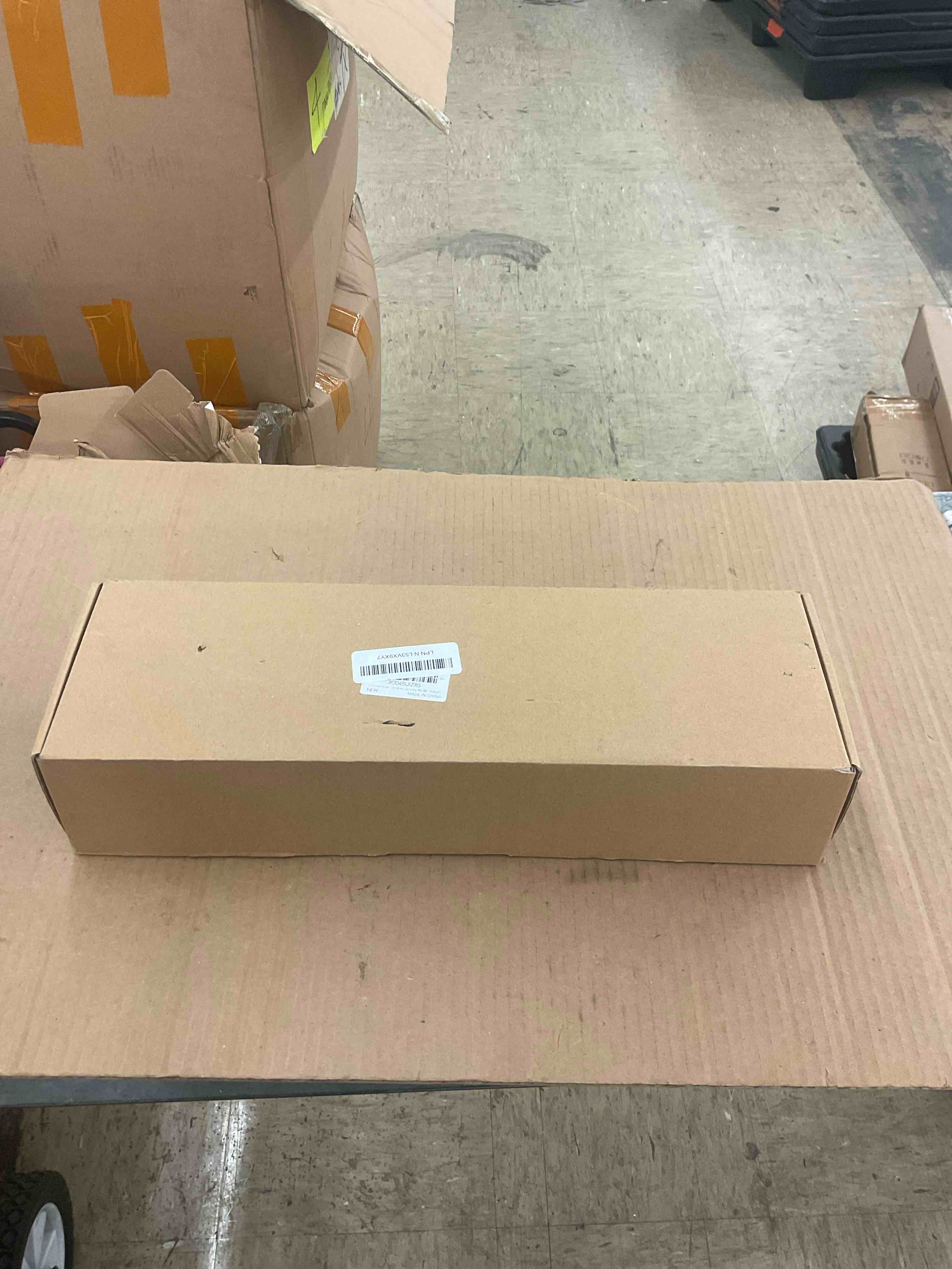https://s3.amazonaws.com/lotting-images-prod/BoxBids/PPE2248026_1770144474110.jpeg