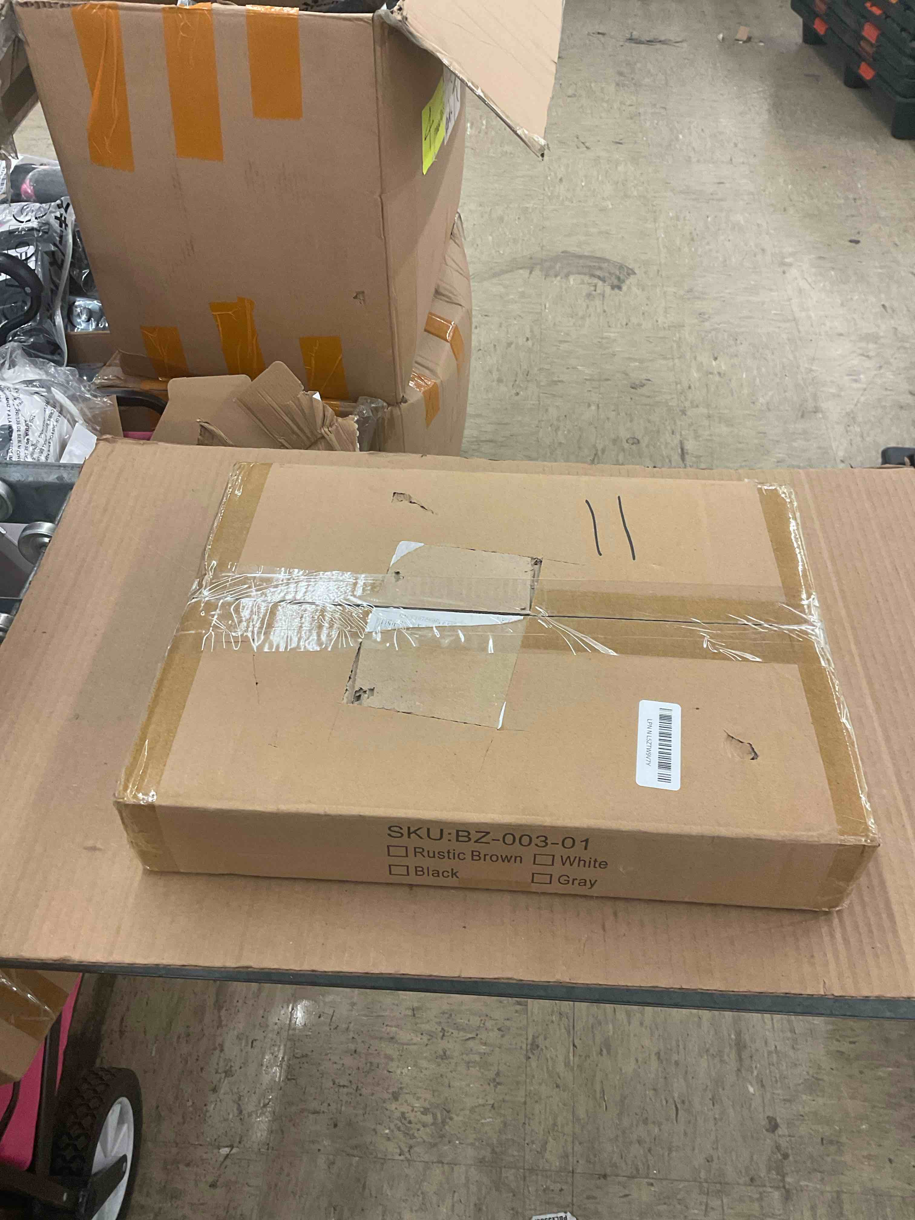 https://s3.amazonaws.com/lotting-images-prod/BoxBids/PPE2248073_1770151508295.jpeg
