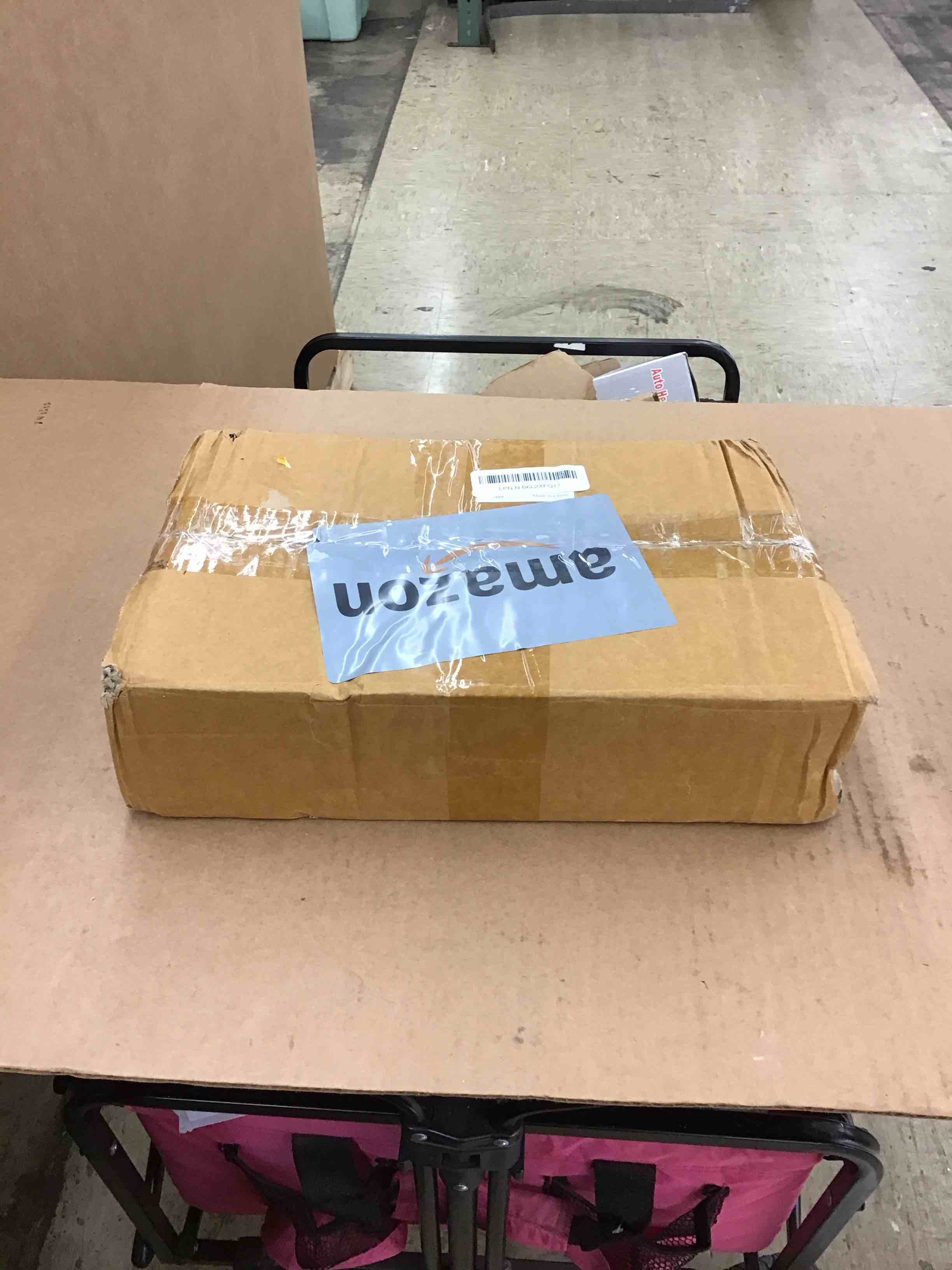 https://s3.amazonaws.com/lotting-images-prod/BoxBids/PPE2248288_1773424909021.jpeg
