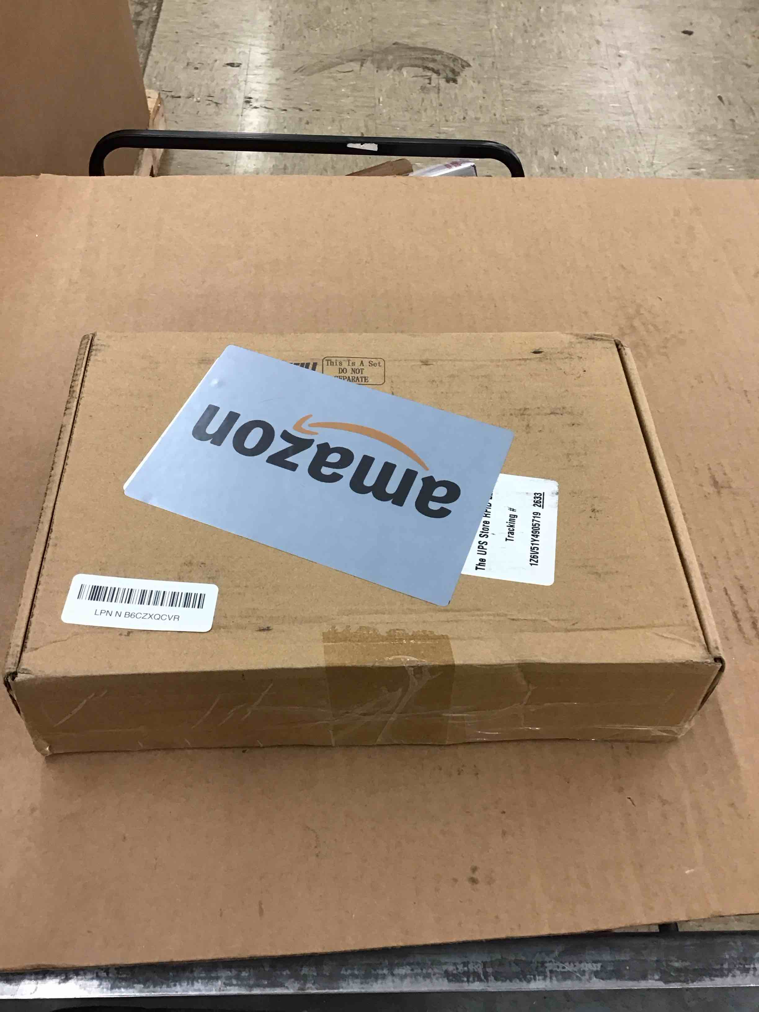 https://s3.amazonaws.com/lotting-images-prod/BoxBids/PPE2248315_1773427858716.jpeg