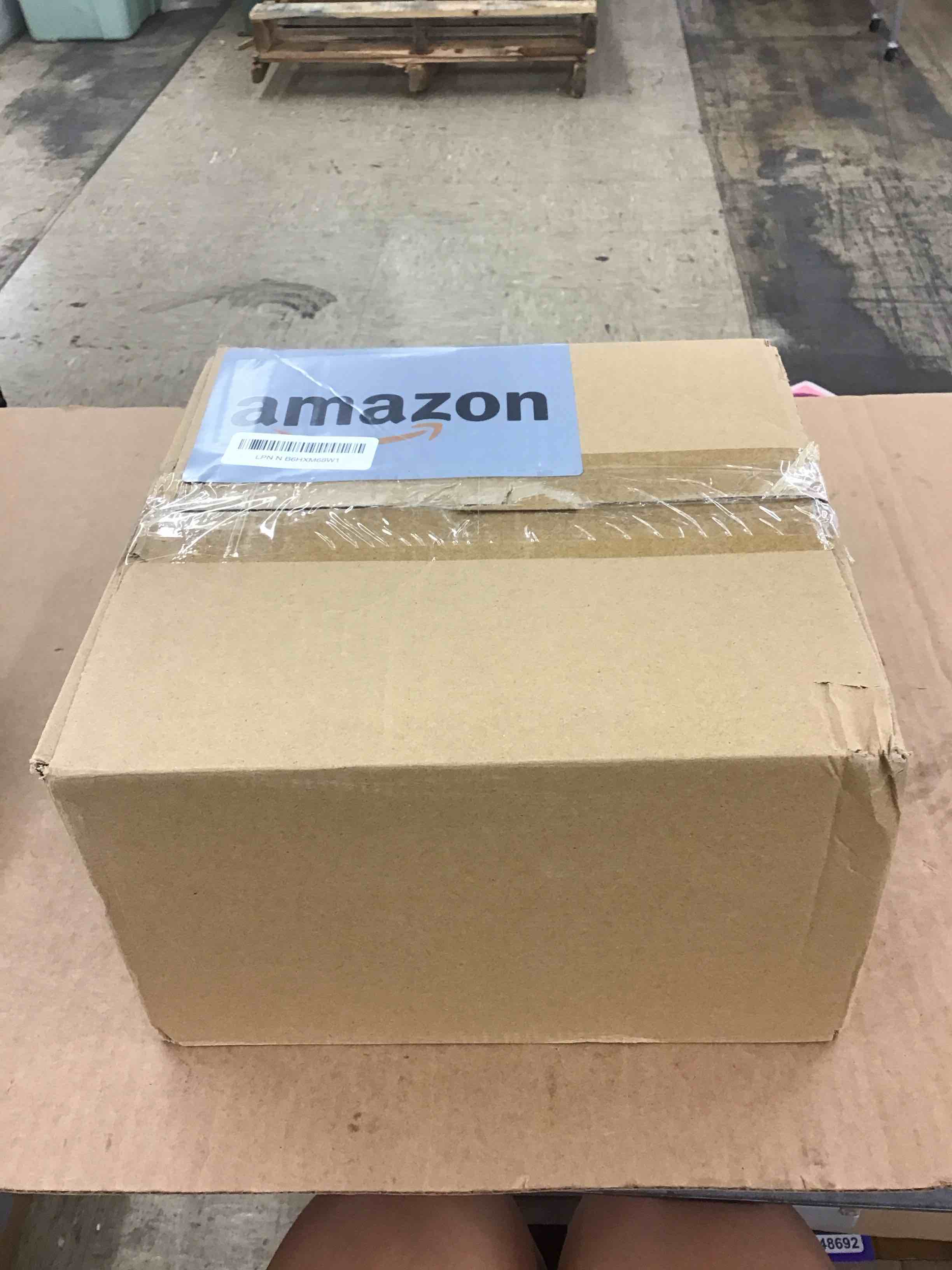 https://s3.amazonaws.com/lotting-images-prod/BoxBids/PPE2248708_1775053905953.jpeg