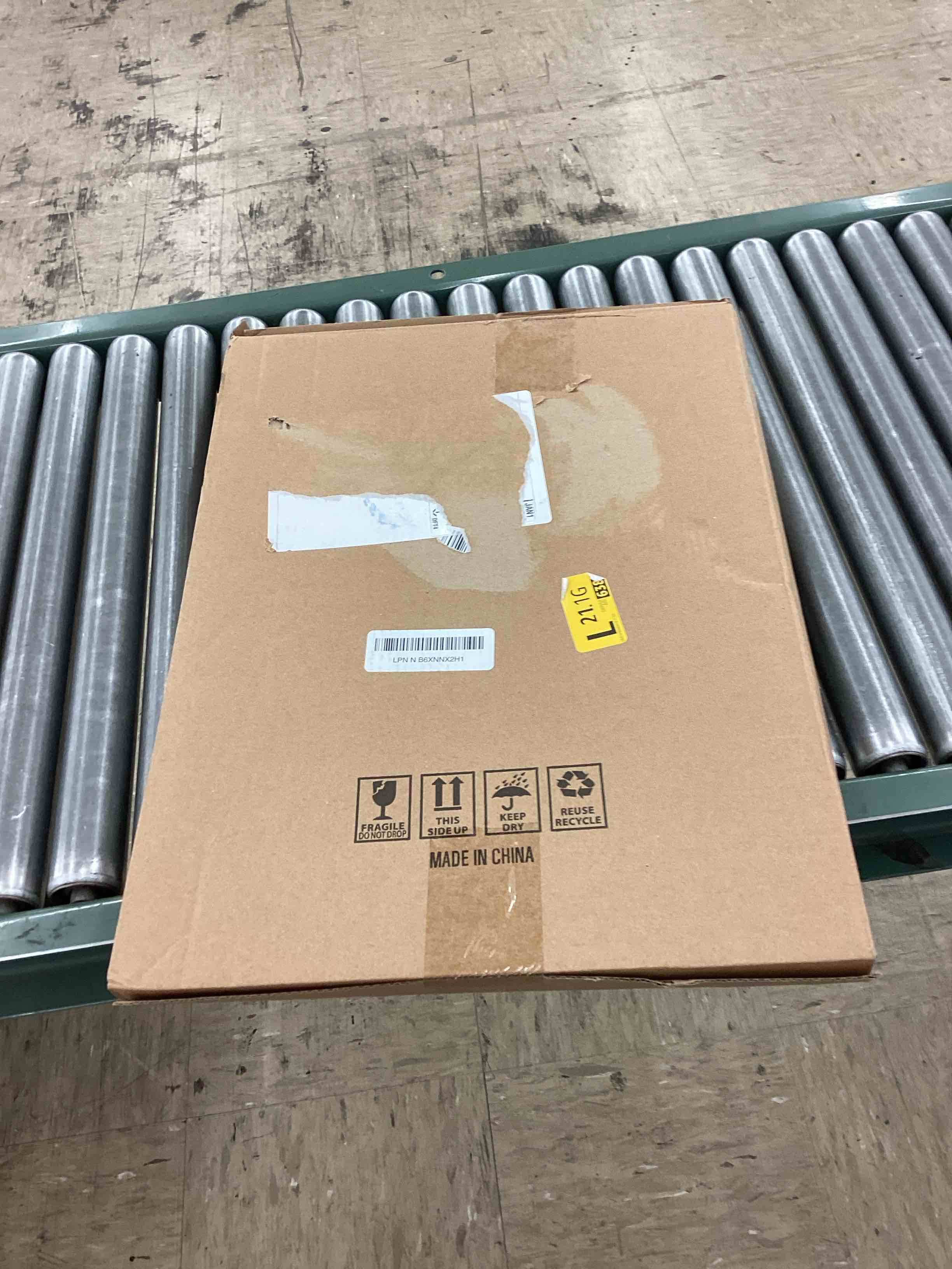 https://s3.amazonaws.com/lotting-images-prod/BoxBids/PPE2248811_1775222378907.jpeg