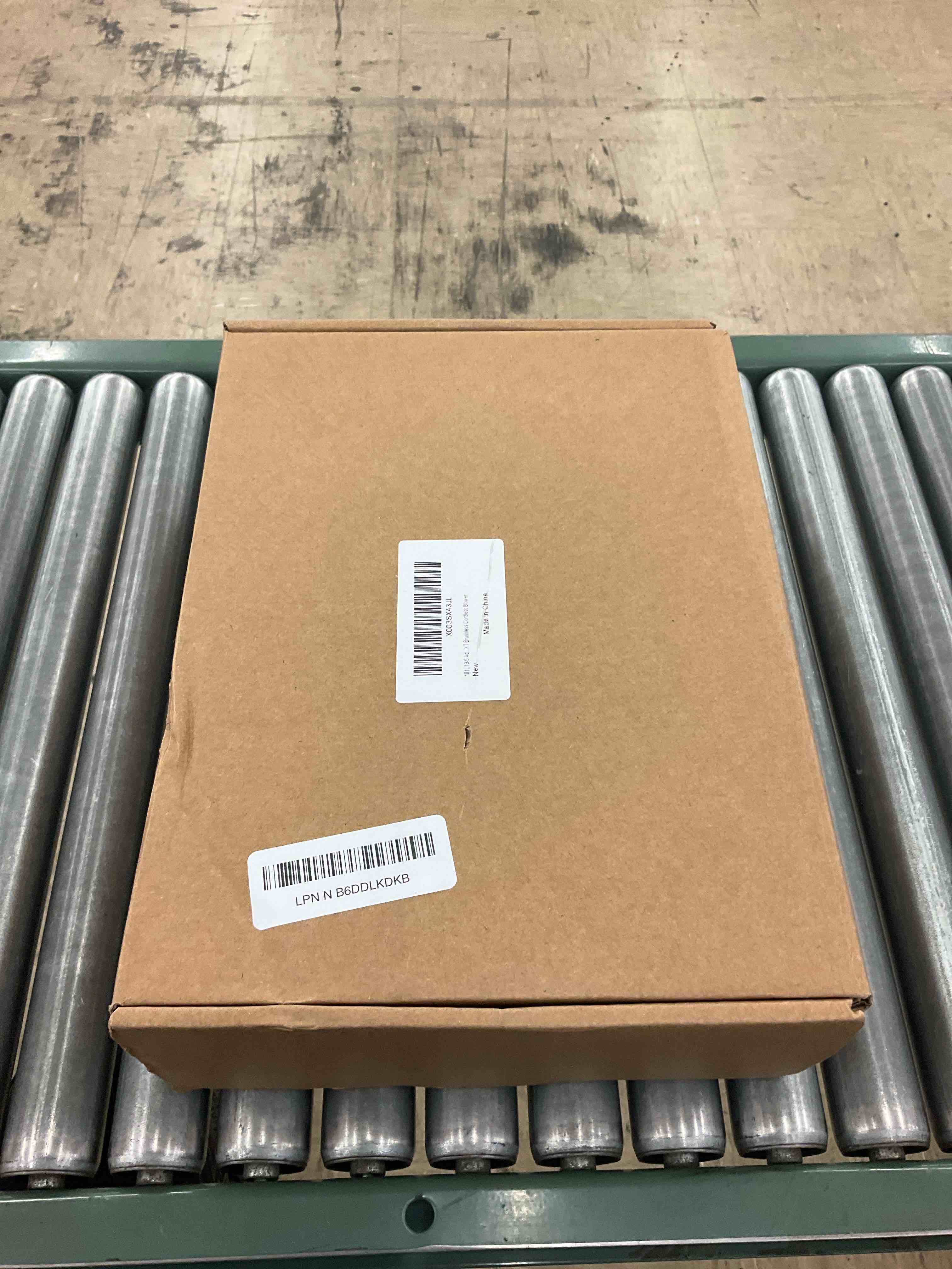 https://s3.amazonaws.com/lotting-images-prod/BoxBids/PPE2248978_1775503570030.jpeg
