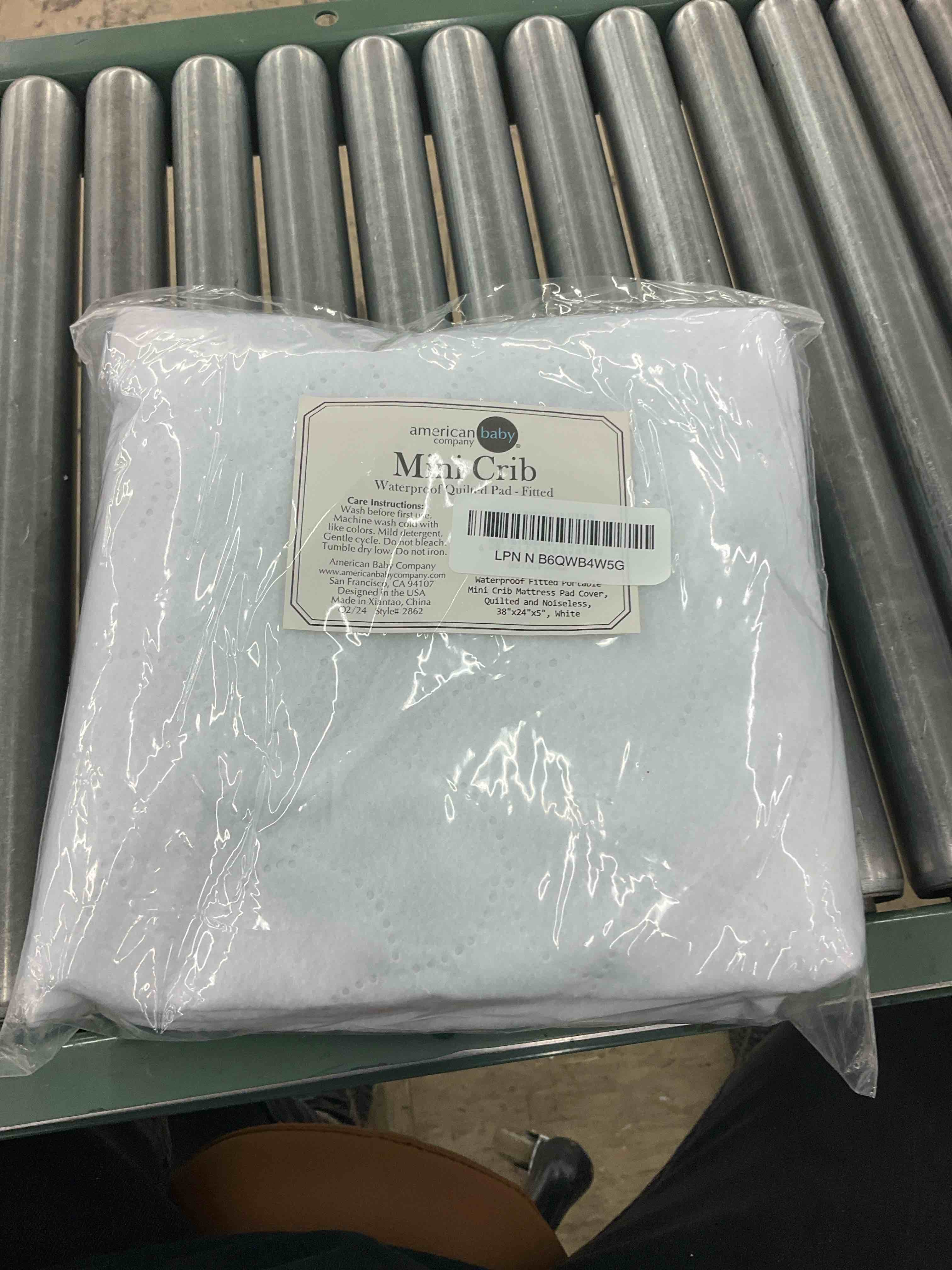 https://s3.amazonaws.com/lotting-images-prod/BoxBids/PPE2248988_1775504976251.jpeg
