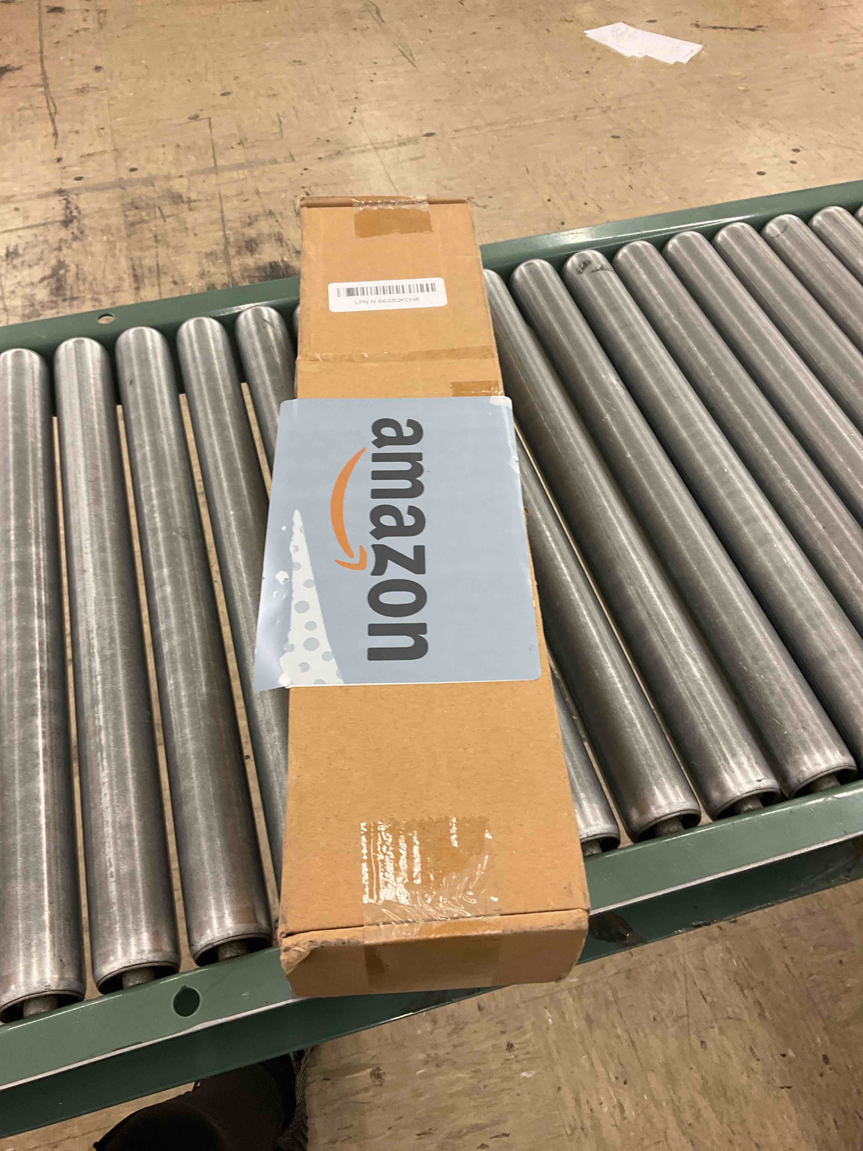 https://s3.amazonaws.com/lotting-images-prod/BoxBids/PPE2249057_1775579171365.jpeg