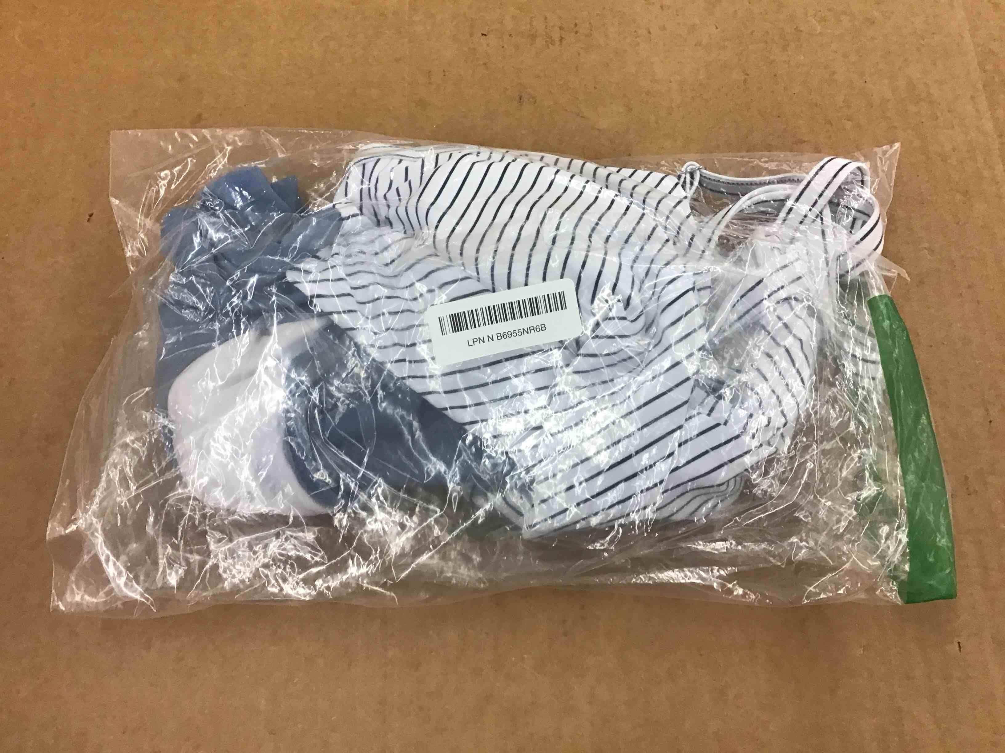https://s3.amazonaws.com/lotting-images-prod/BoxBids/PPE2249242_1777474752246.jpeg