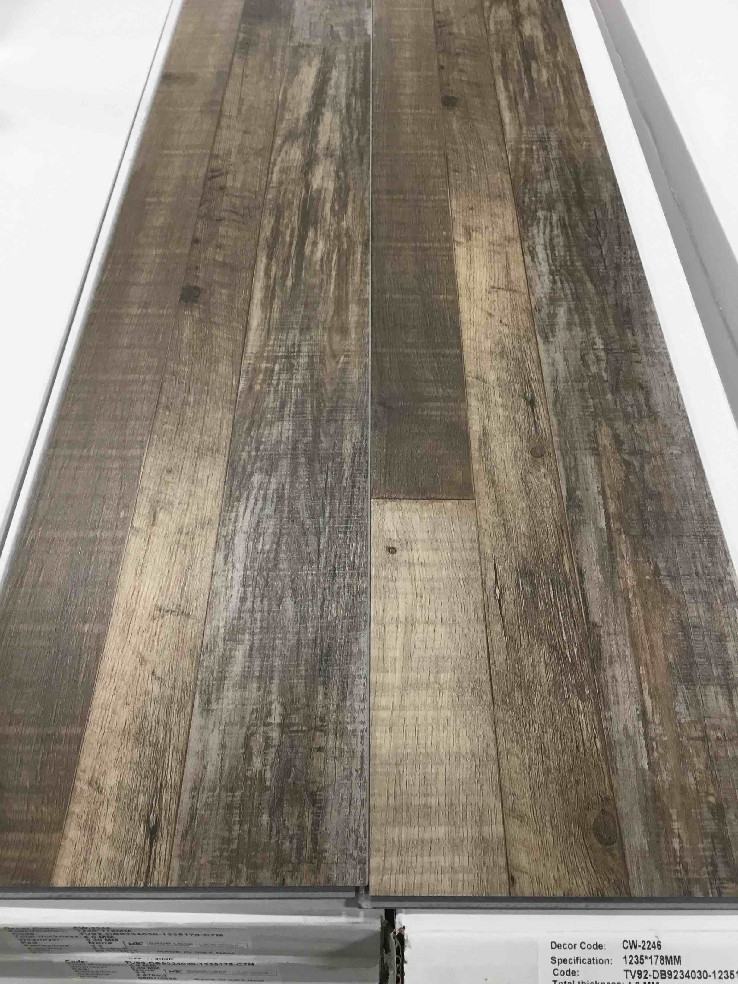 vinyl flooring CW-2246 48.62” x 7.008” x 4 mm 26.02 sq ft / case 50 cases - bid per sq ft