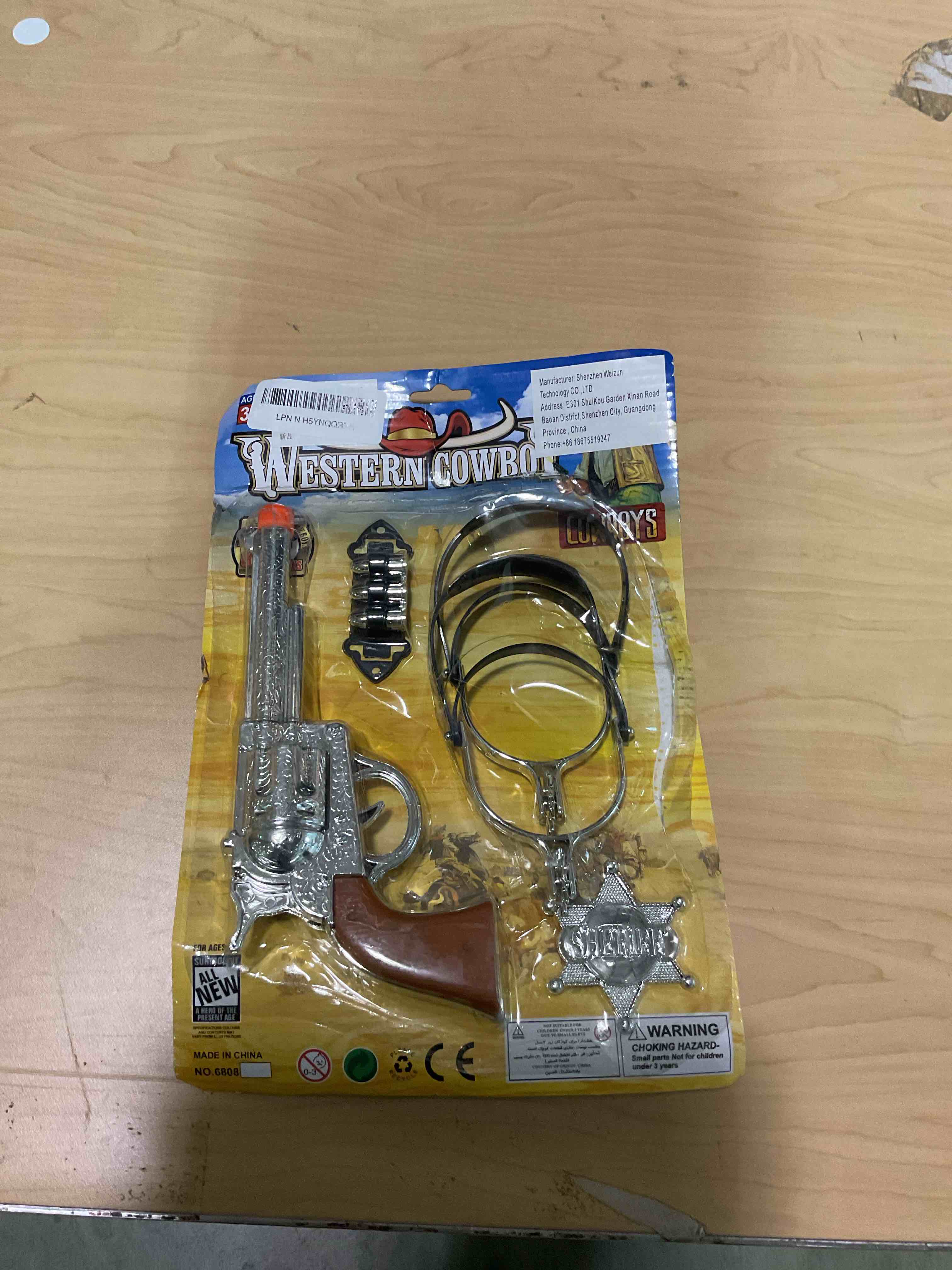 Condition photo showing As Is for Western Cowboy Toy Gun Kids Role Playing Set, Includes Toy Gun, Badge, Bullets, Spurs,Suitable for Role-Playing, Pretend Play, Cowboy Theme Party Costume Accessories, Stage Performance Props. Cowboy Gun Set With Spurs