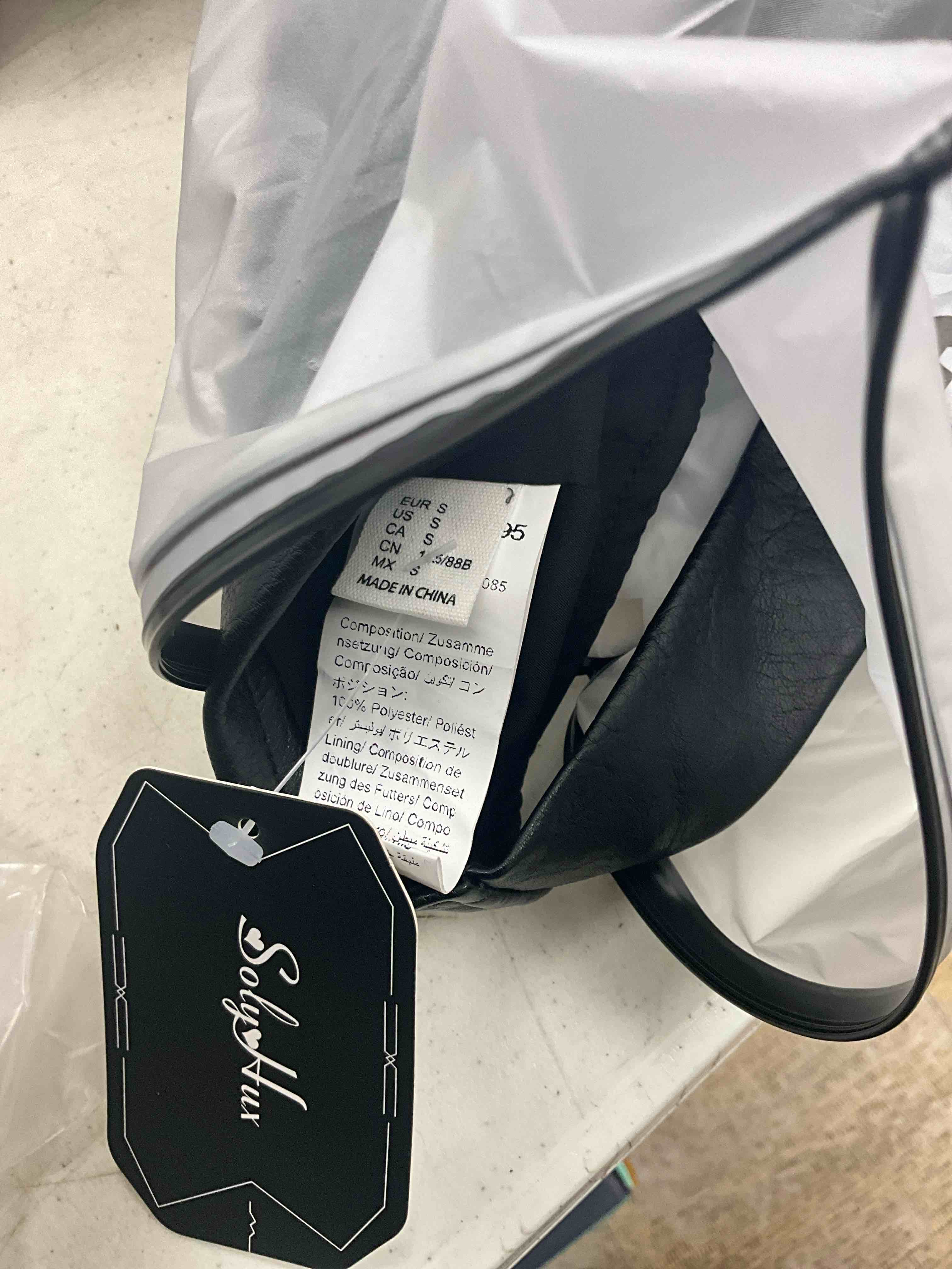 Condition photo showing New/Like New for SweatyRocks Women's PU Leather Halter Tank Tops Sexy Deep V Neck Lace Up Back Vest Party Clubwear