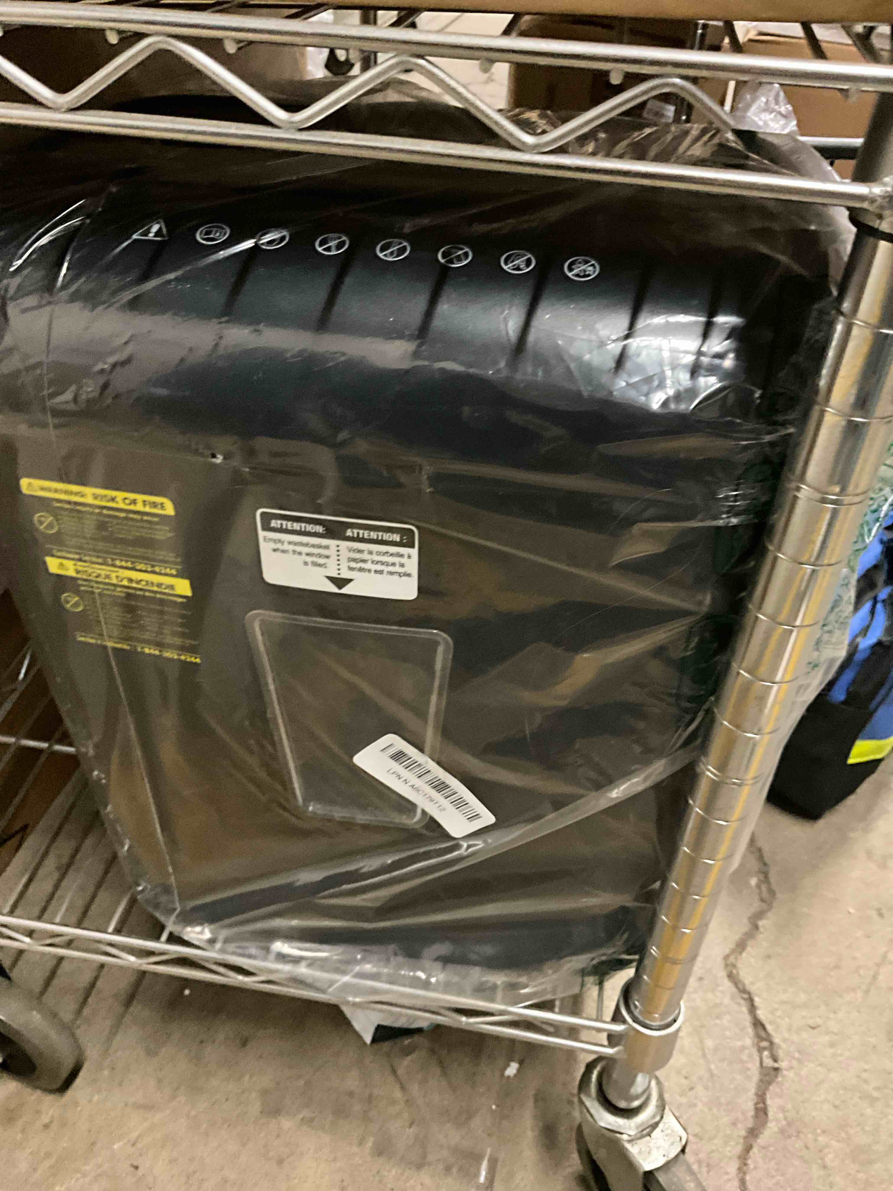 Condition photo showing Good Condition for Amazon Basics 12 Sheet Cross Cut Paper and Credit Card Home Office Shredder with 4.8 Gallon Bin, Black