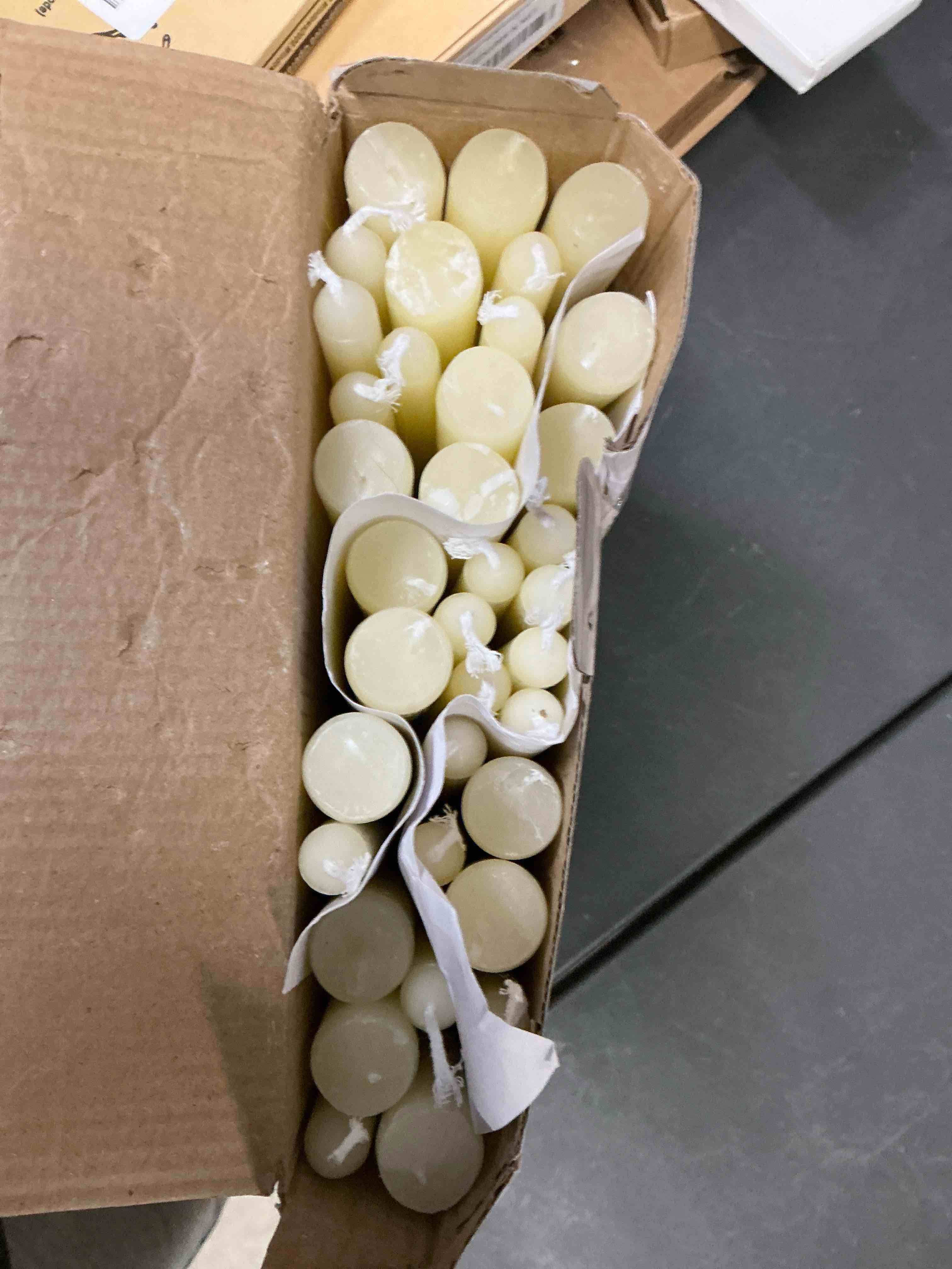 Condition photo showing Good Condition for 36 Pack Ivory White Taper Candles, 7-8 Hours Burn Time, Unscented, Smokeless and Dripless, 0.8 x 10 Inch Dinner Candle Set for Household, Wedding, Party and Home Décor Candlesticks