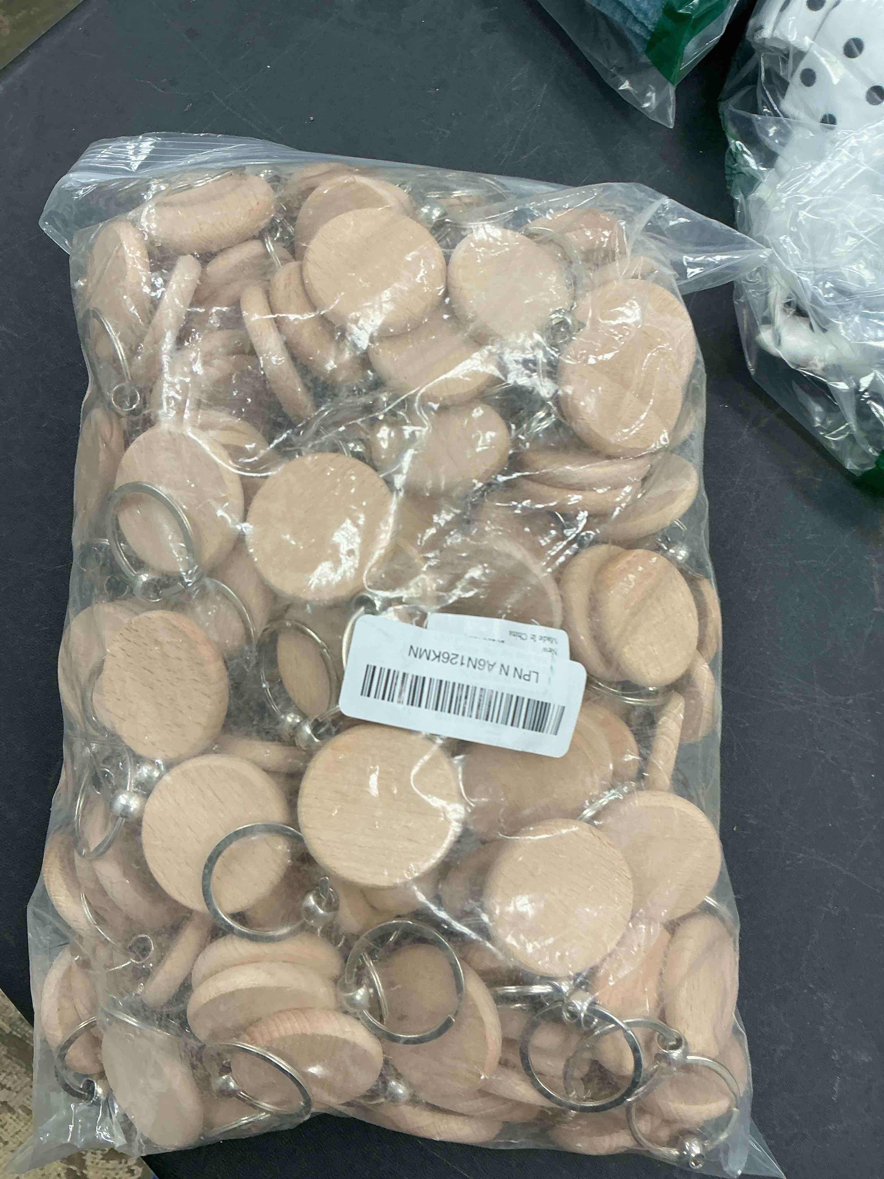 Condition photo showing New/Like New for JUXYES 200 PCS Unfinished Wooden Keychain Blanks for Engraving, Wood Engraving Blanks Key Chain, DIY Round Wood Keychain Tags Unfinished Wooden Key Ring Key Tag, 40mm