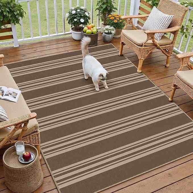 8x10 Brown stripped indoor area rug See photos similar not exact 