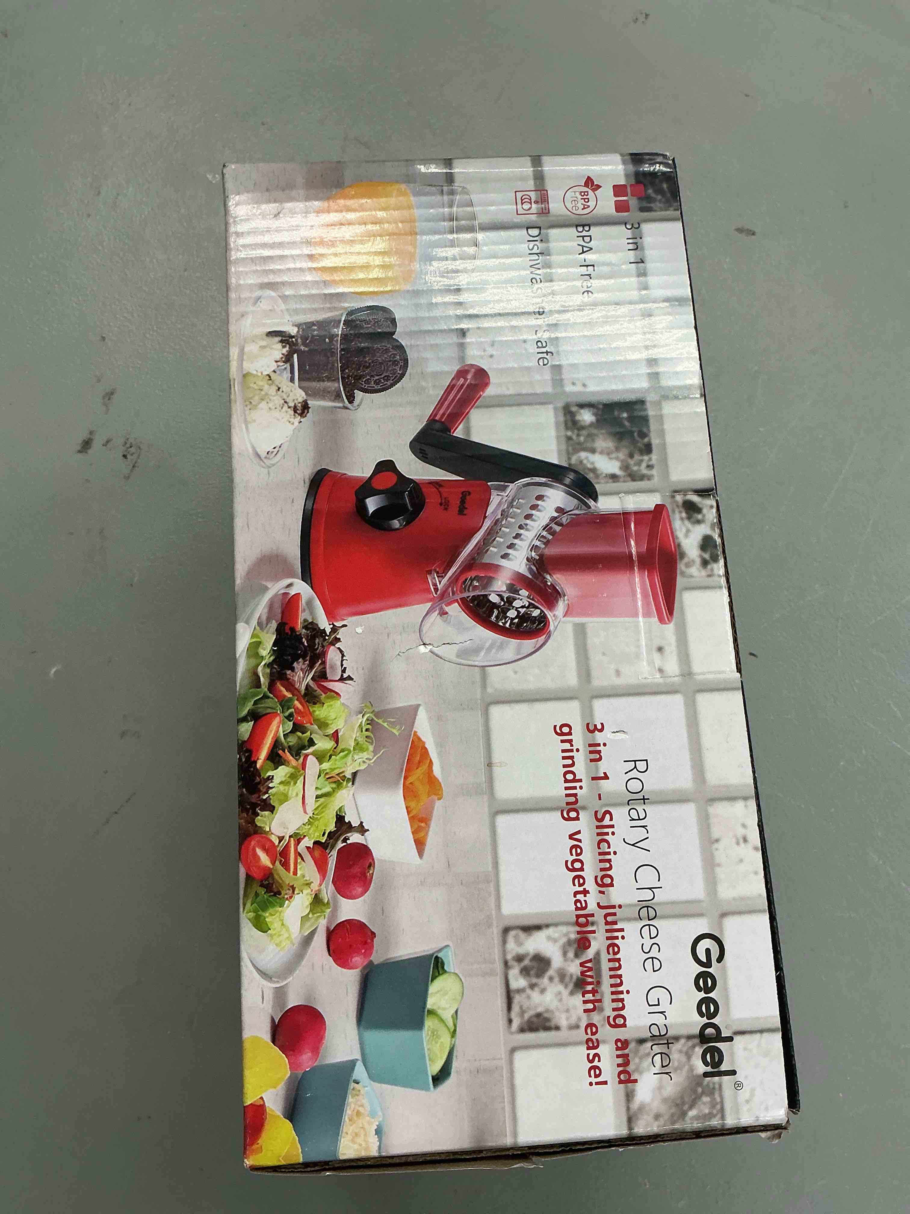 Condition photo showing New/Like New for geedel rotary cheese grater, kitchen mandoline vegetable slicer with 3 interchangeable blades, easy to clean rotary grater slicer for fruit, vegetables, nuts purple 3 blades