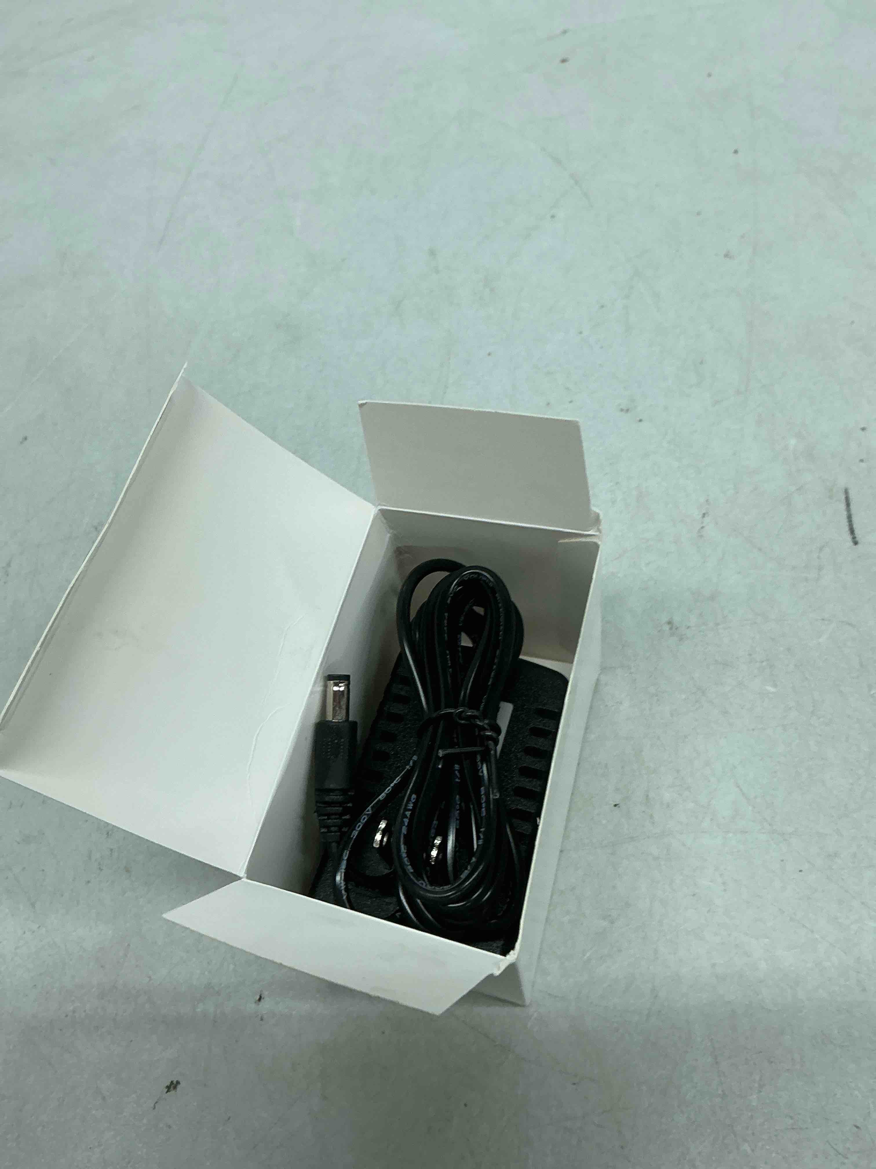 Condition photo showing Good Condition for 9v ac/dc power supply adapter for boss, dunlop, danelectro, digitech, electro harmonix, tc electronic, zoom guitar multi effects pedal - compatible with a wide range of electronic effects pedals.
