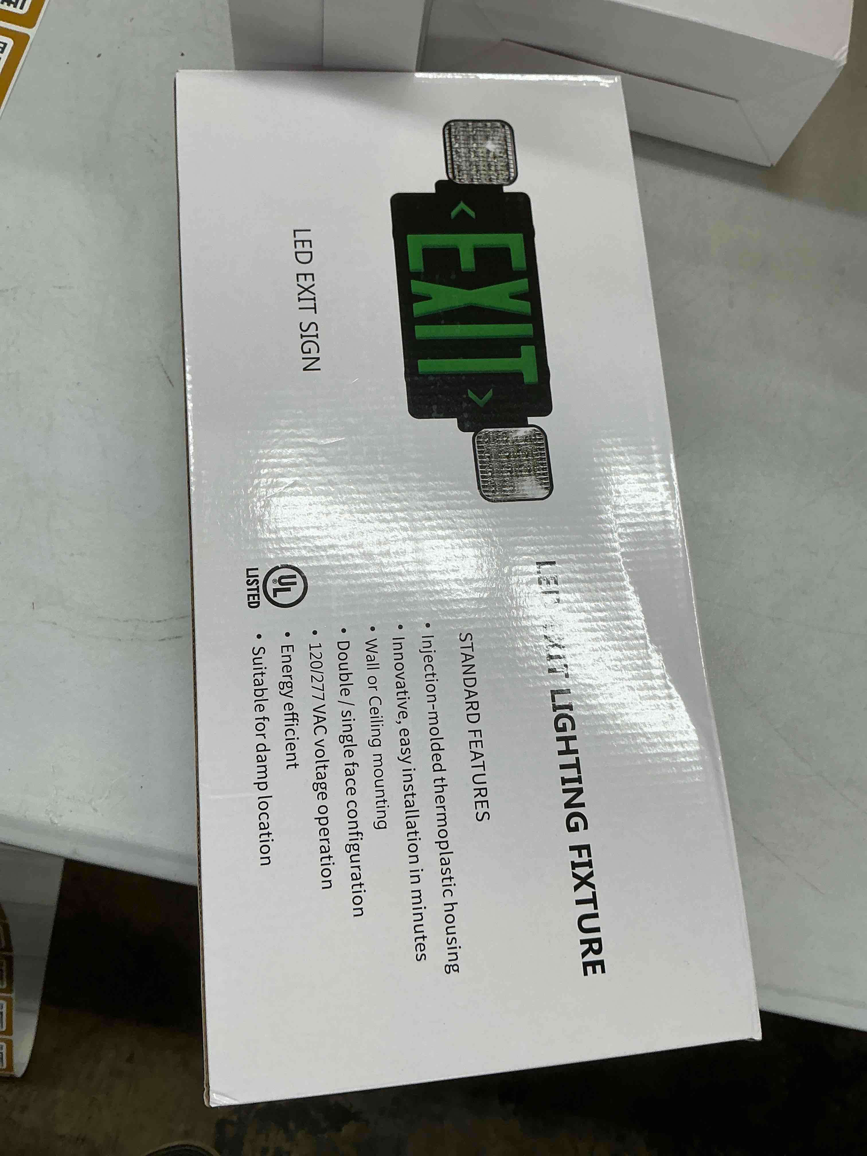 Condition photo showing New/Like New for gzruiyang black housing exit sign with emergency lights green, led emergency exit light with battery backup, ul 924 certified, ac 120/277v, commercial emergency lights combo for business - 1 pack