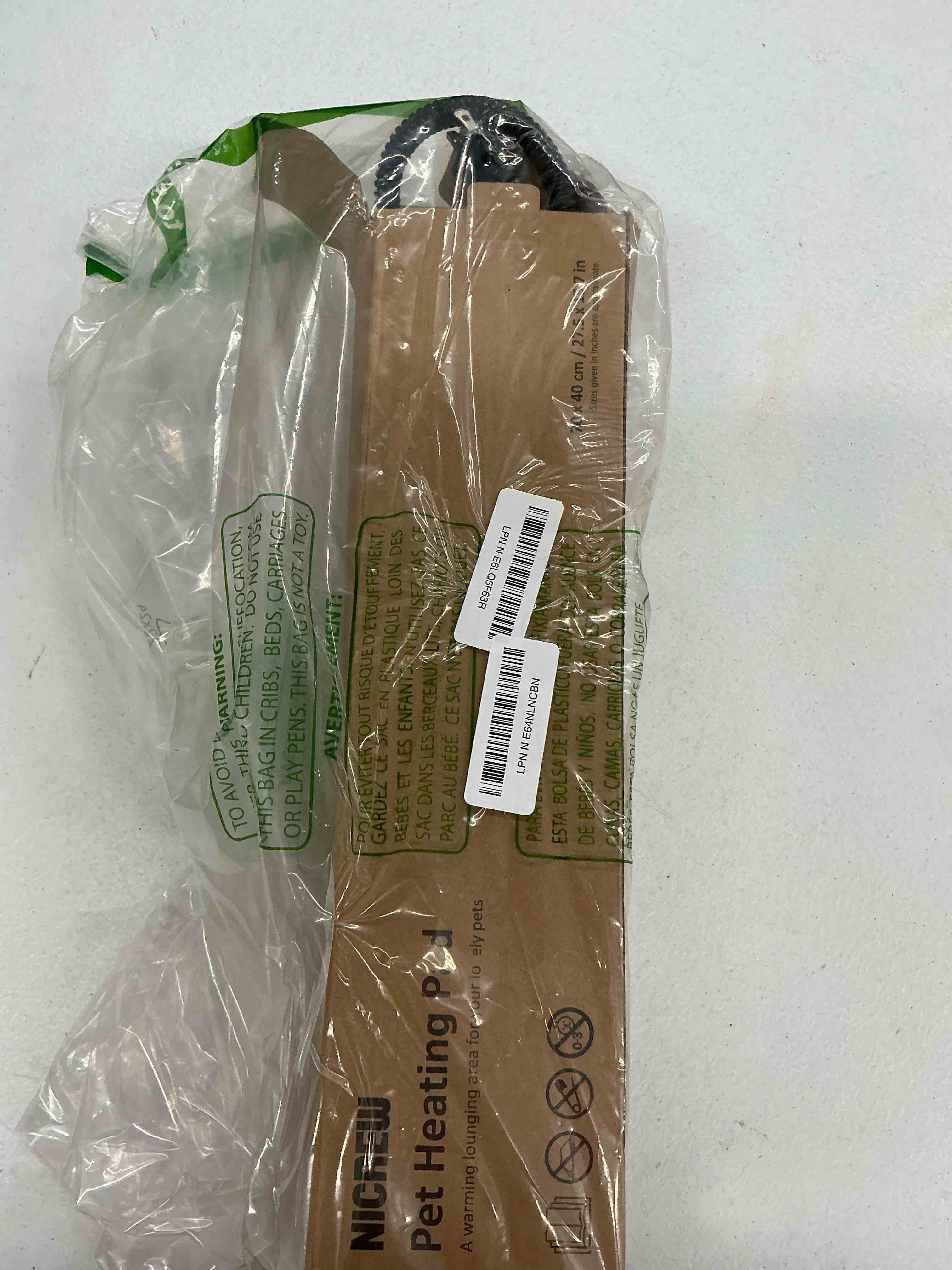 Condition photo showing Good Condition for nicrew dog heating pad, consistent heat, 27.5"x15.7", 50w, khaki | auto temperature control, chew-resistant cord, removable washable cover, ideal for adult cats, small dogs, pet bed & sofa khaki 27.5"l x 15.7"w x 0.4"th