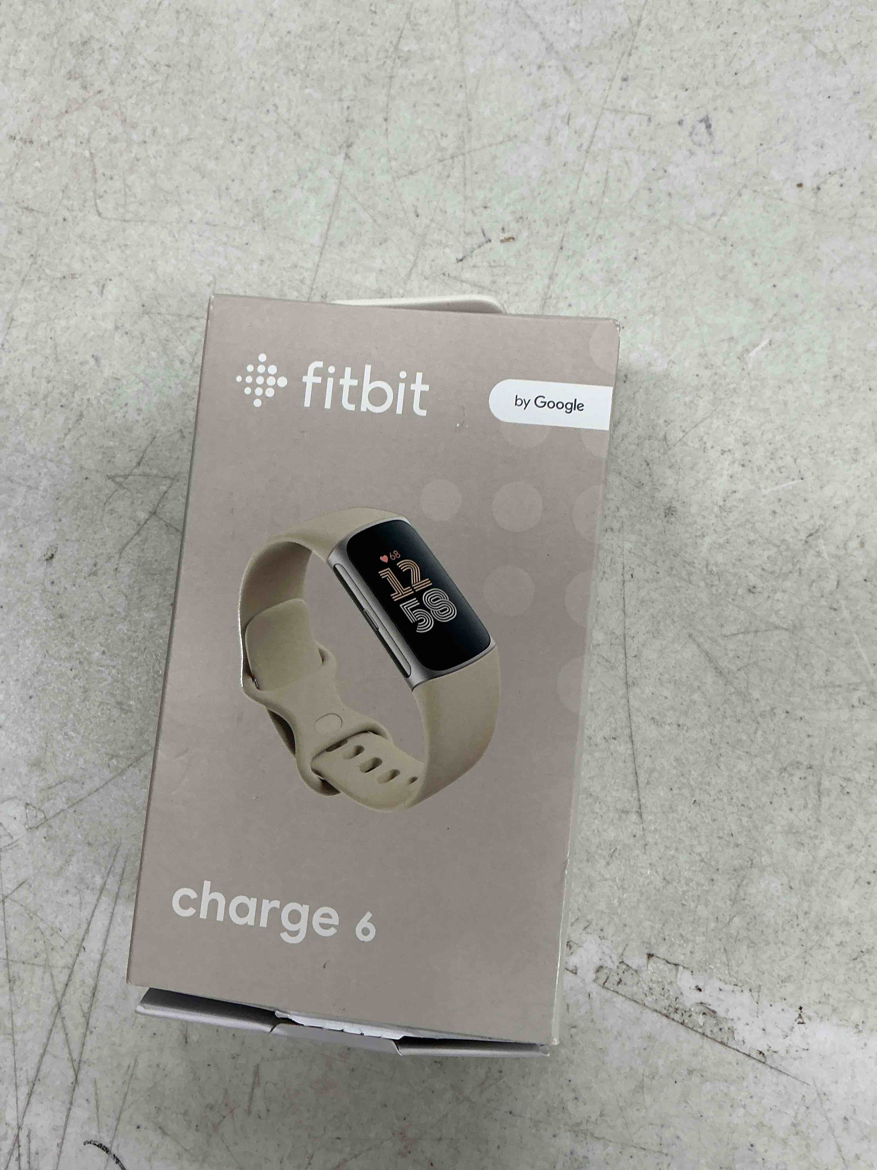 Condition photo showing Good Condition for fitbit charge 6 fitness tracker with google apps, heart rate on exercise equipment, 6-months premium membership included, gps, health tools and more, porcelain/silver, one size (s & l bands included) silver case w/ white band tracker
