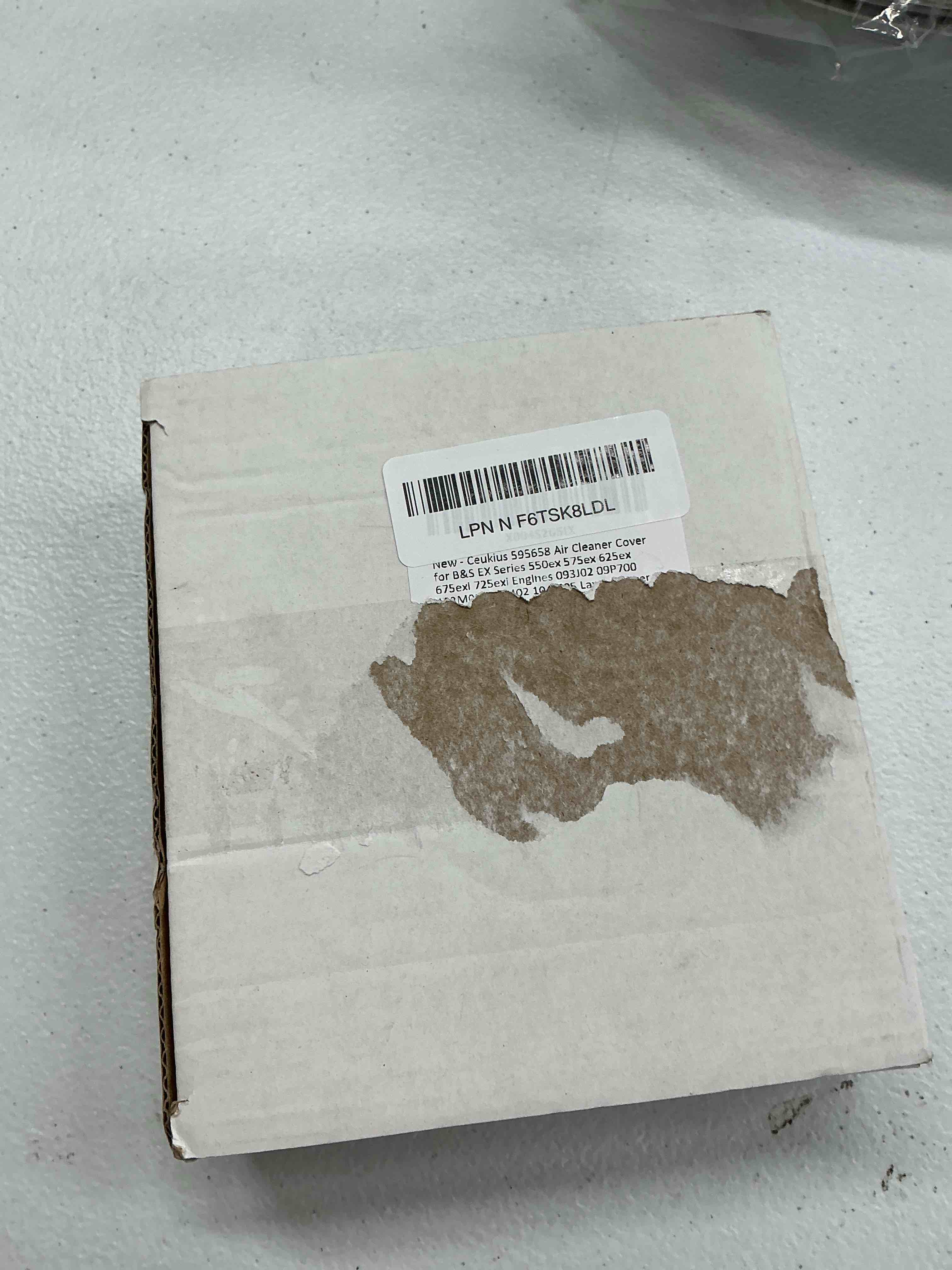 Condition photo showing Good Condition for 595658 air cleaner cover for b&s ex series 550ex 575ex 625ex 675exi 725exi engines 093j02 09p700 103m02 104m02 104m05 lawn mower