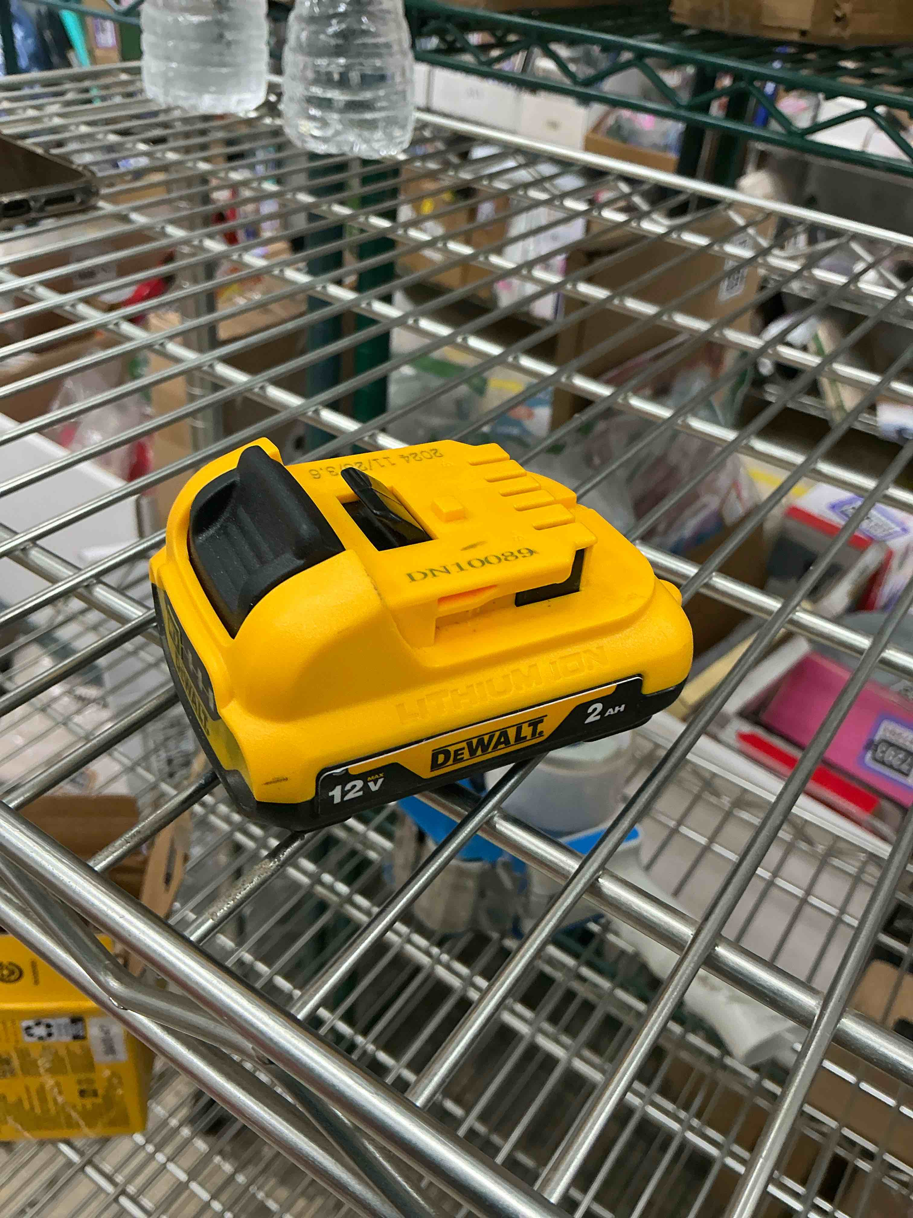 Condition photo showing As Is for dewalt dcb122 12v max* 2ah lithium ion battery