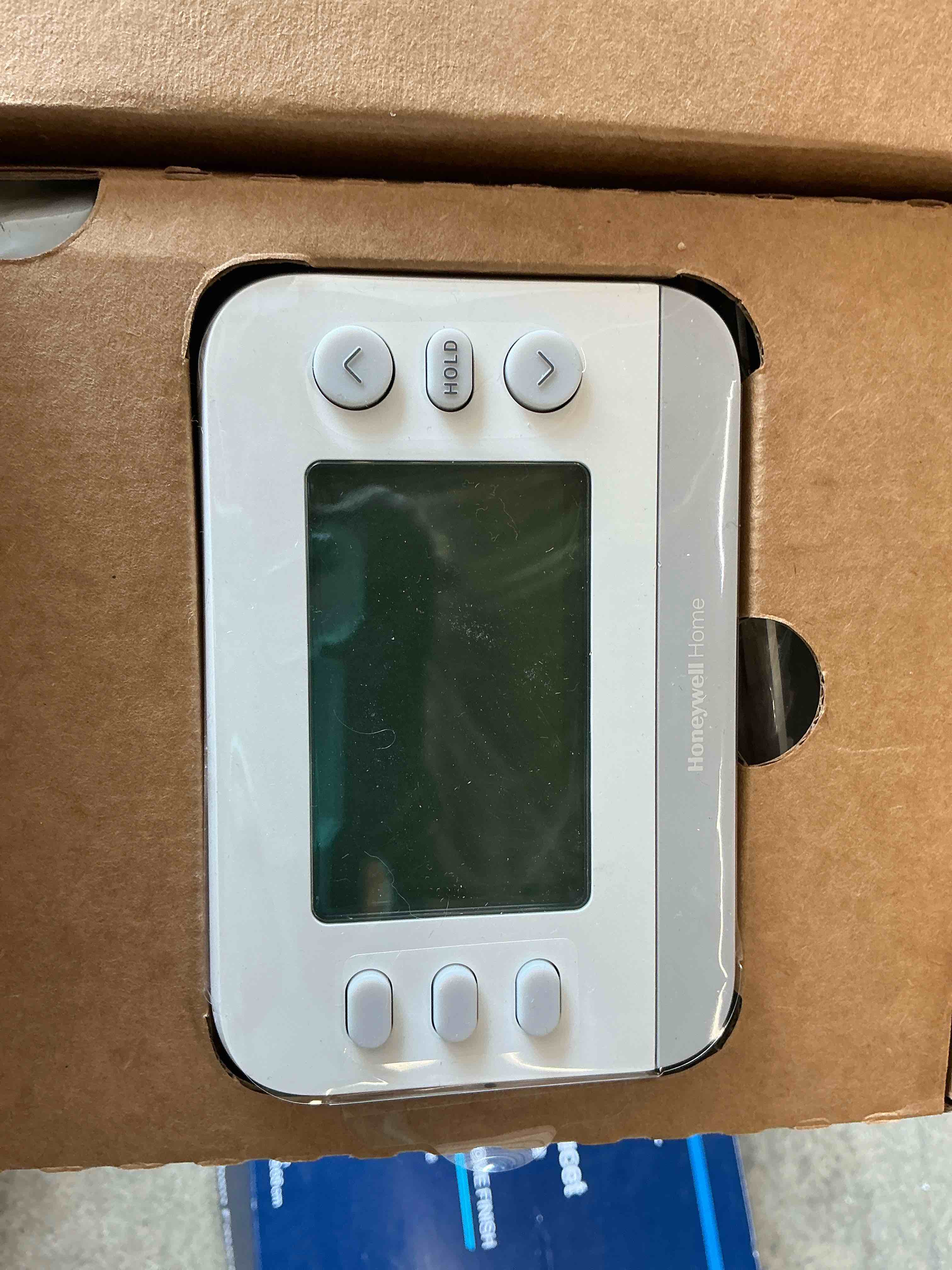 Condition photo showing Good Condition for x2p programmable thermostat, conventional/heat pump, flexible schedule