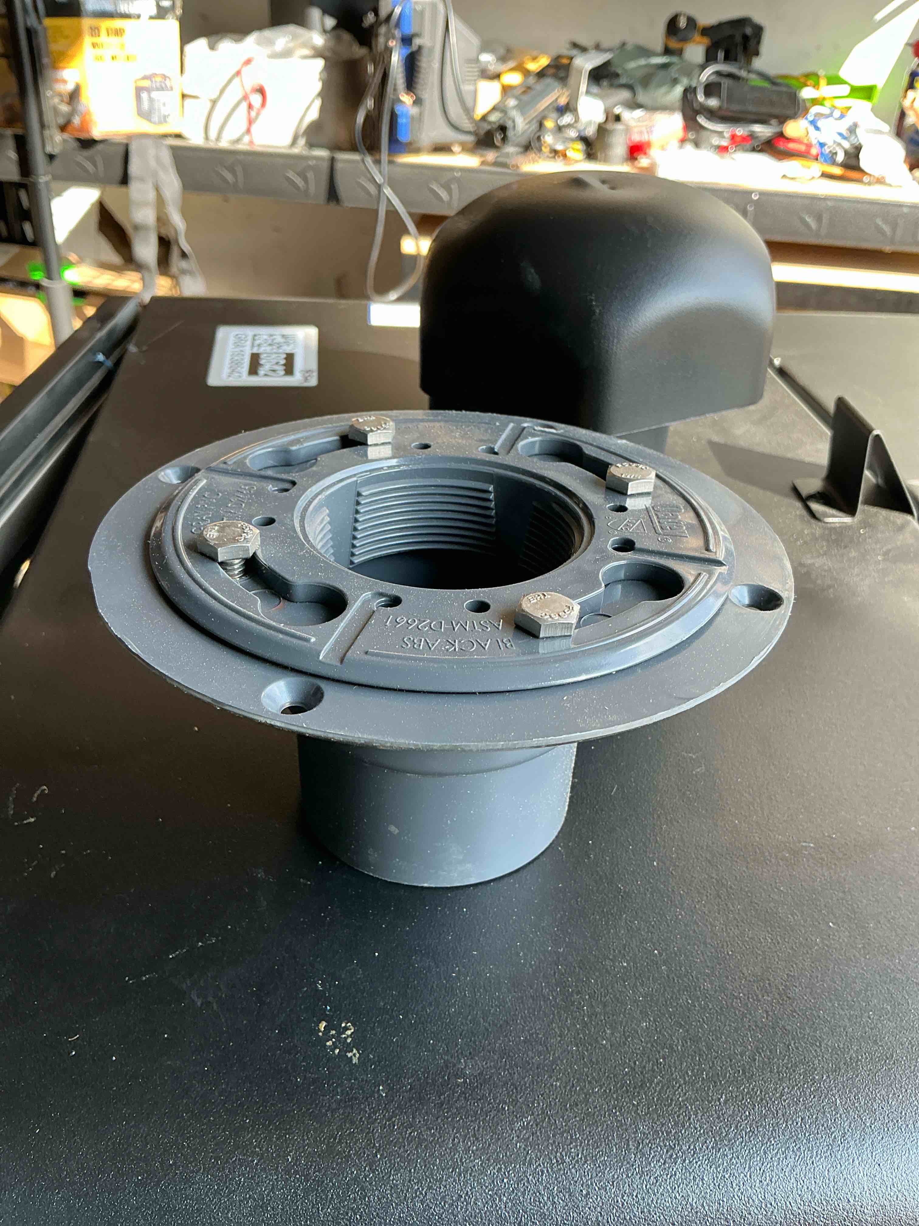 Condition photo showing As Is for oatey 2-in pvc shower drain with square stainless steel strainer