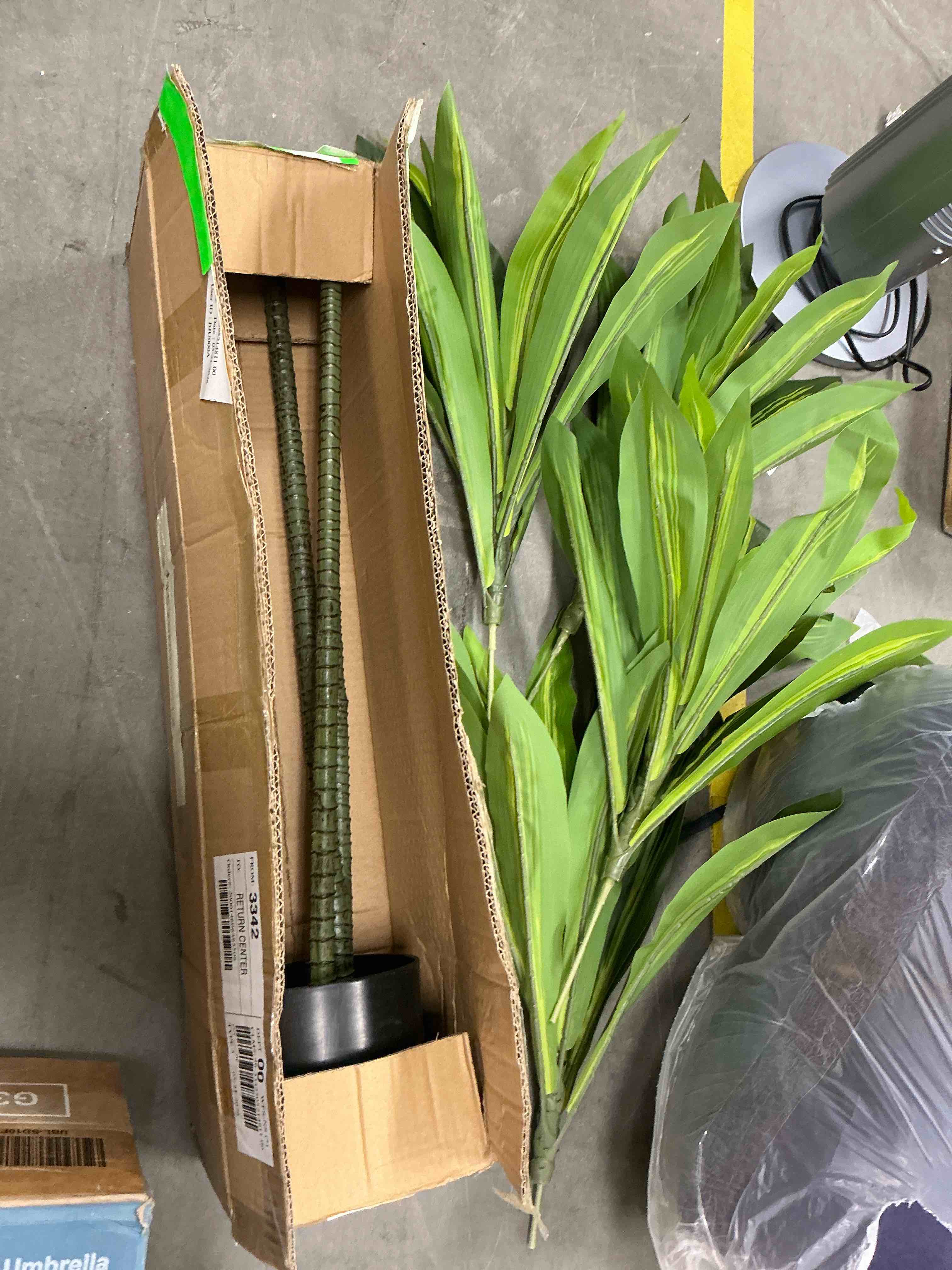 Condition photo showing Good Condition for 5 ft. tall artificial dracaena tree, uv resistant fake dracaena plant, faux floor plant in pot for home