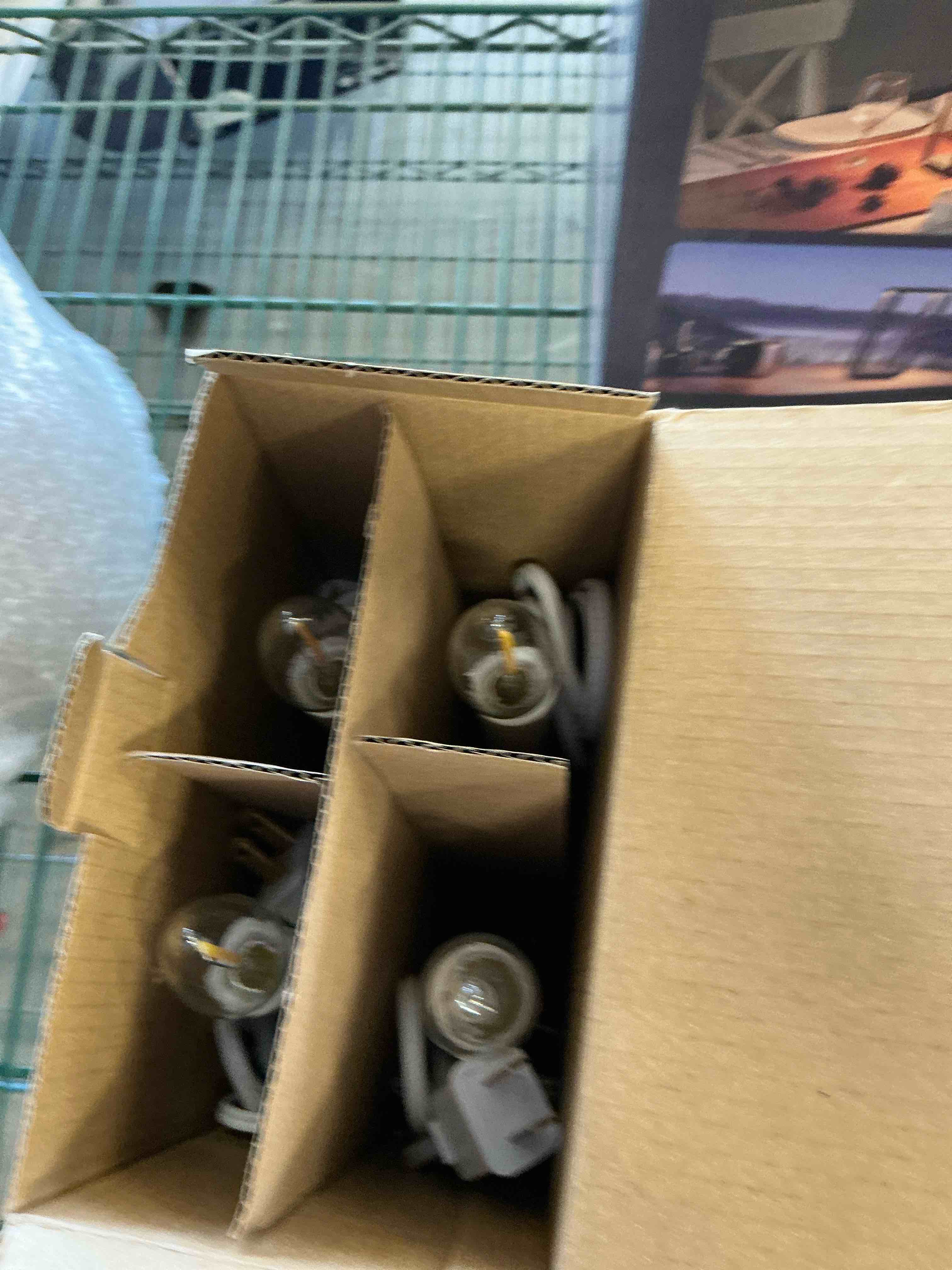 Condition photo showing Good Condition for Window Candles with Sensor Dusk to Dawn Electric Corded, 9.6'' Plug-in LED Window Candle Lights with Black Holder and 6ft Cord, Christmas Candles for Windows Decoration, UL Listed, 4 Pack Black Dusk-to-Dawn