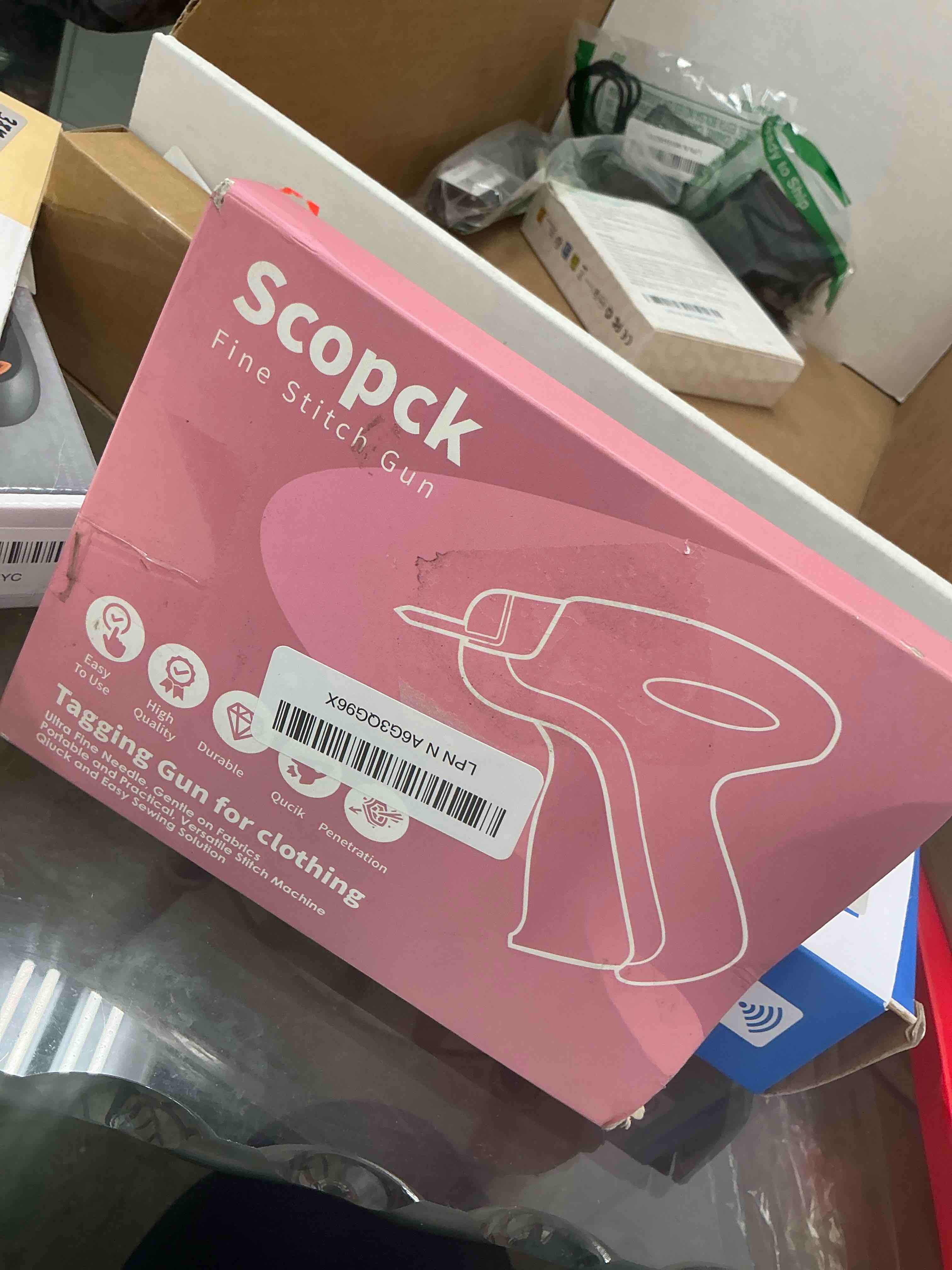 Condition photo showing Good Condition for Stitch Gun for Clothes - Handheld Stitch Gun Quick Clothing Fixer - Tagging Gun - Includes 6 Needle, 1000 Black Fasteners & 1000 White Fasteners (Pink/Orange)