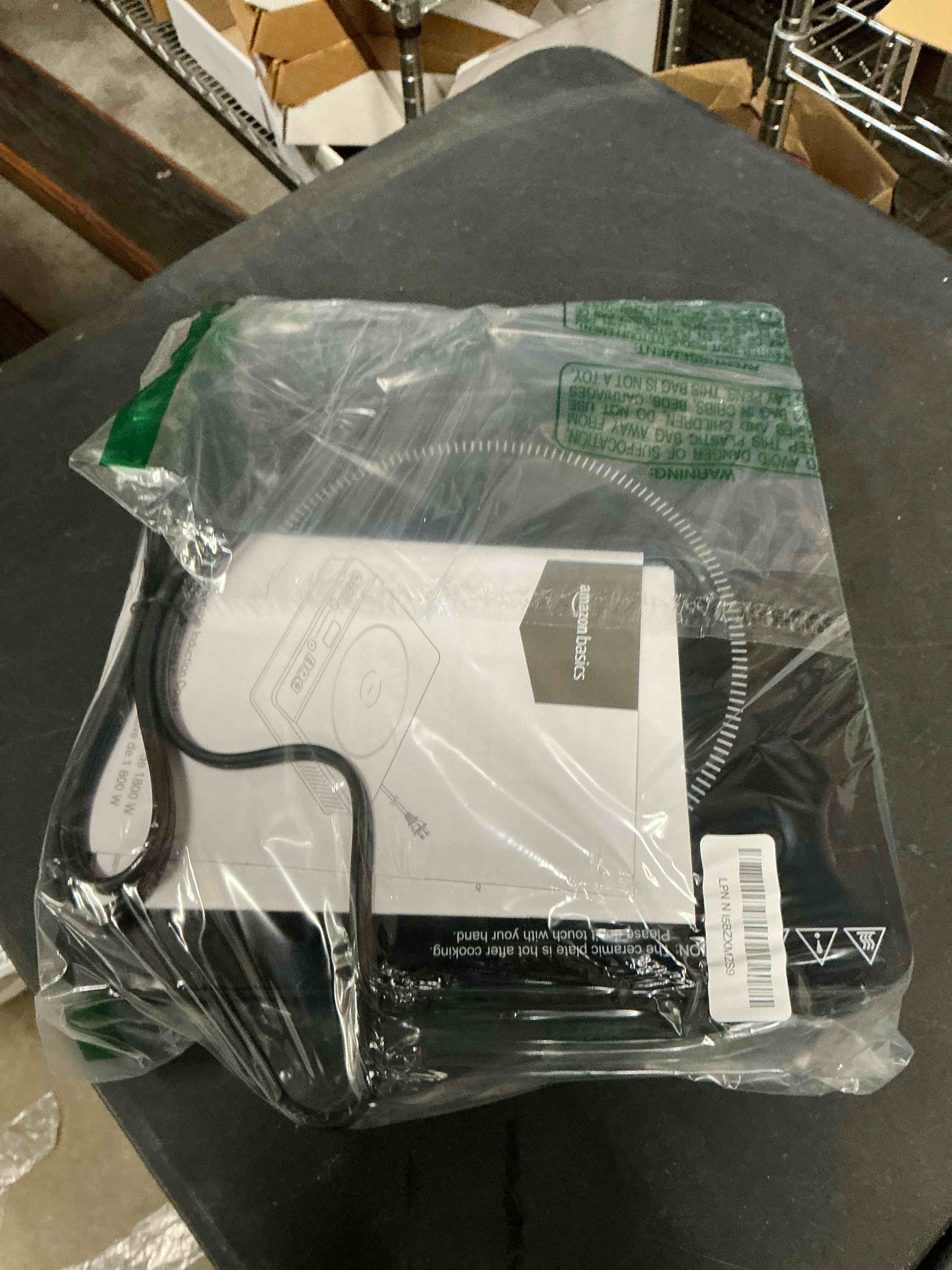 Condition photo showing Good Condition for Amazon Basics 1800W Electric Portable Induction Cooktop, Induction Burner with Child Lock, Overheat Protection, Timer, 8 Power Settings, Up to 440°F, for Cookware with Diameter 5.7"-8.2", Black